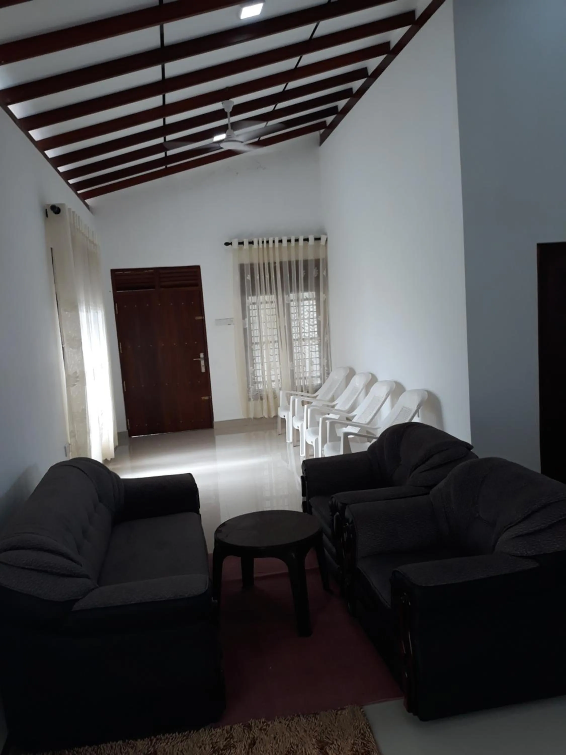 Seating area, Bed in Padmi Villa