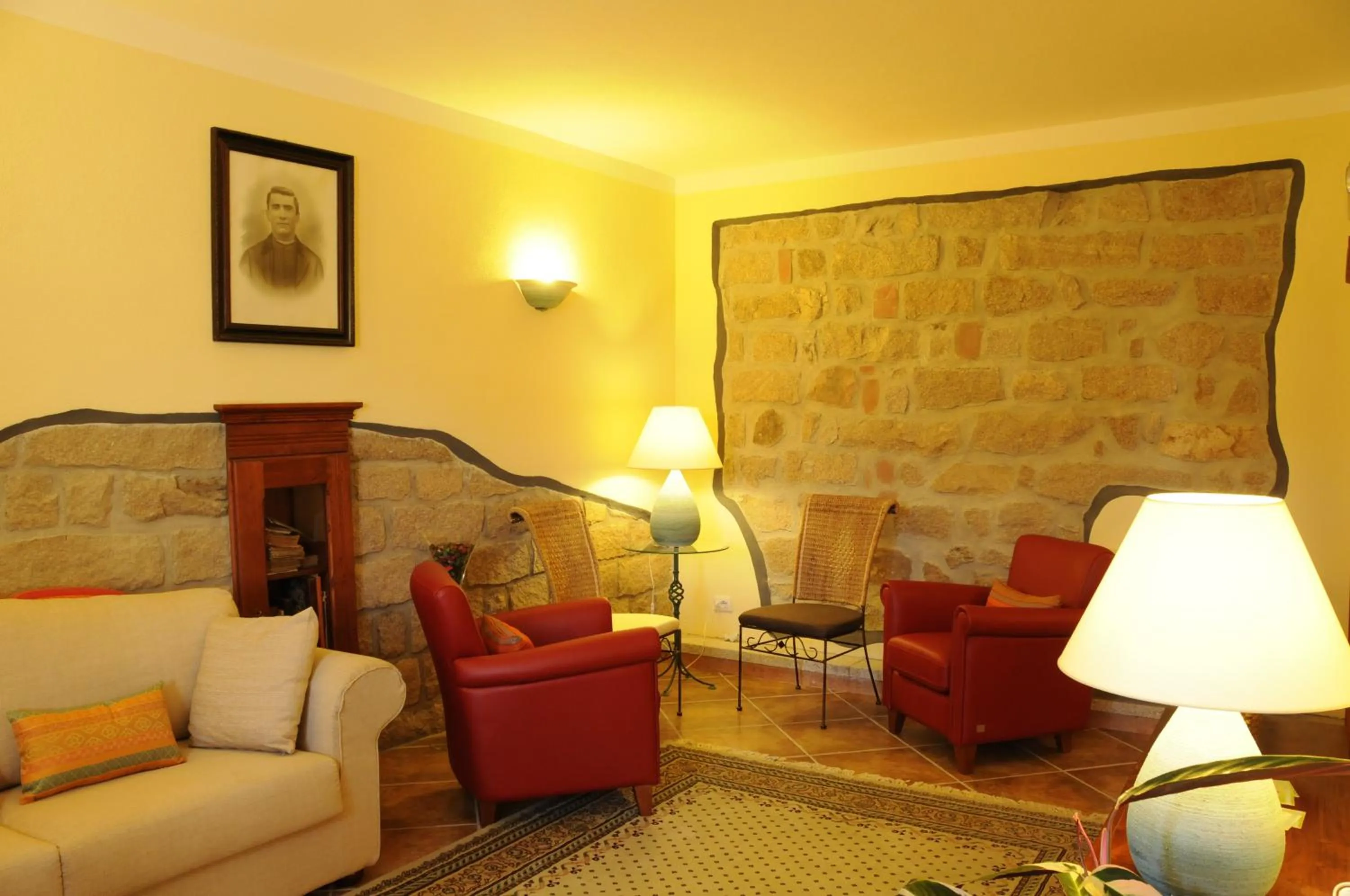 Communal lounge/ TV room in La Casa Di Babbai