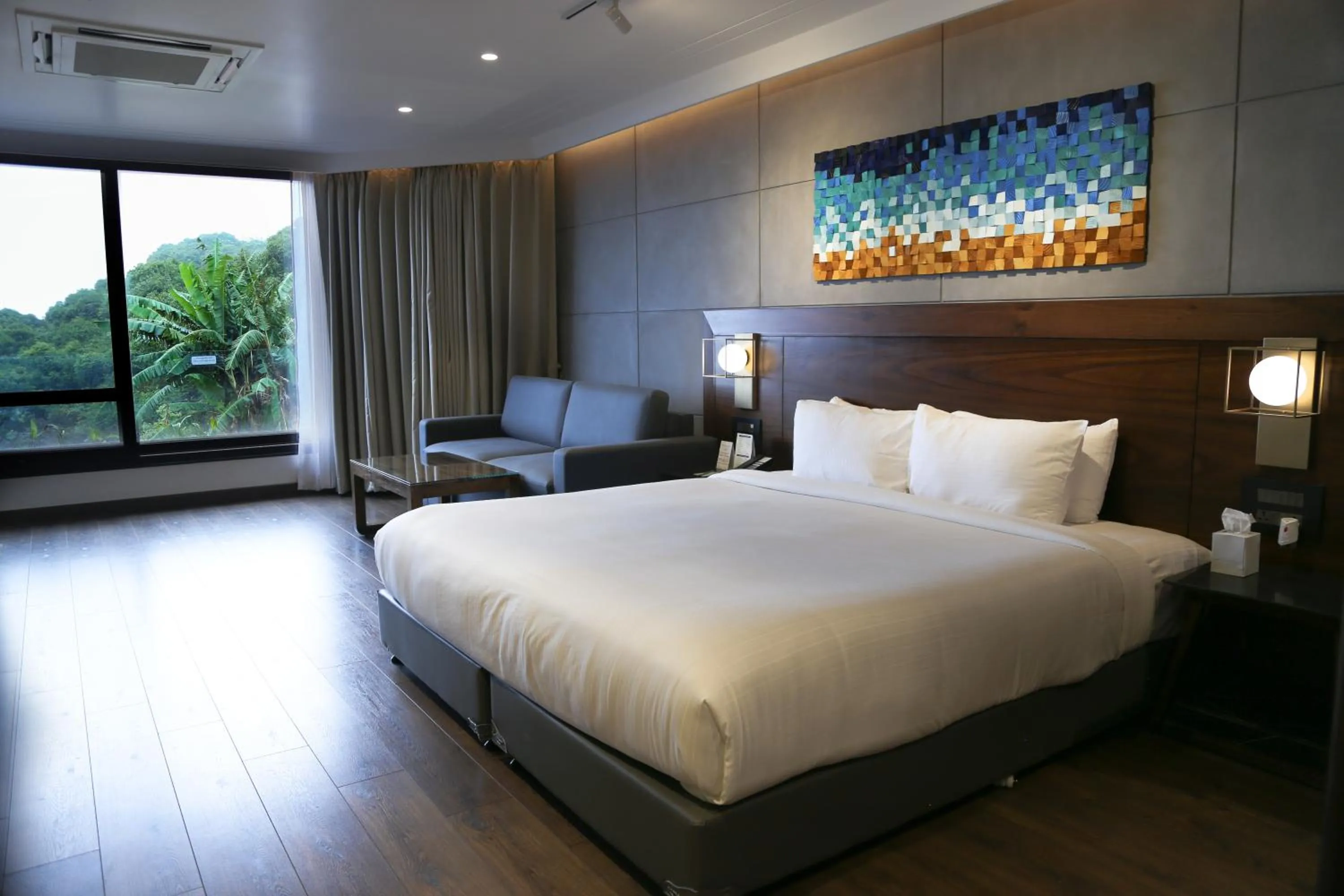 Bed in Brightland Resort & Spa