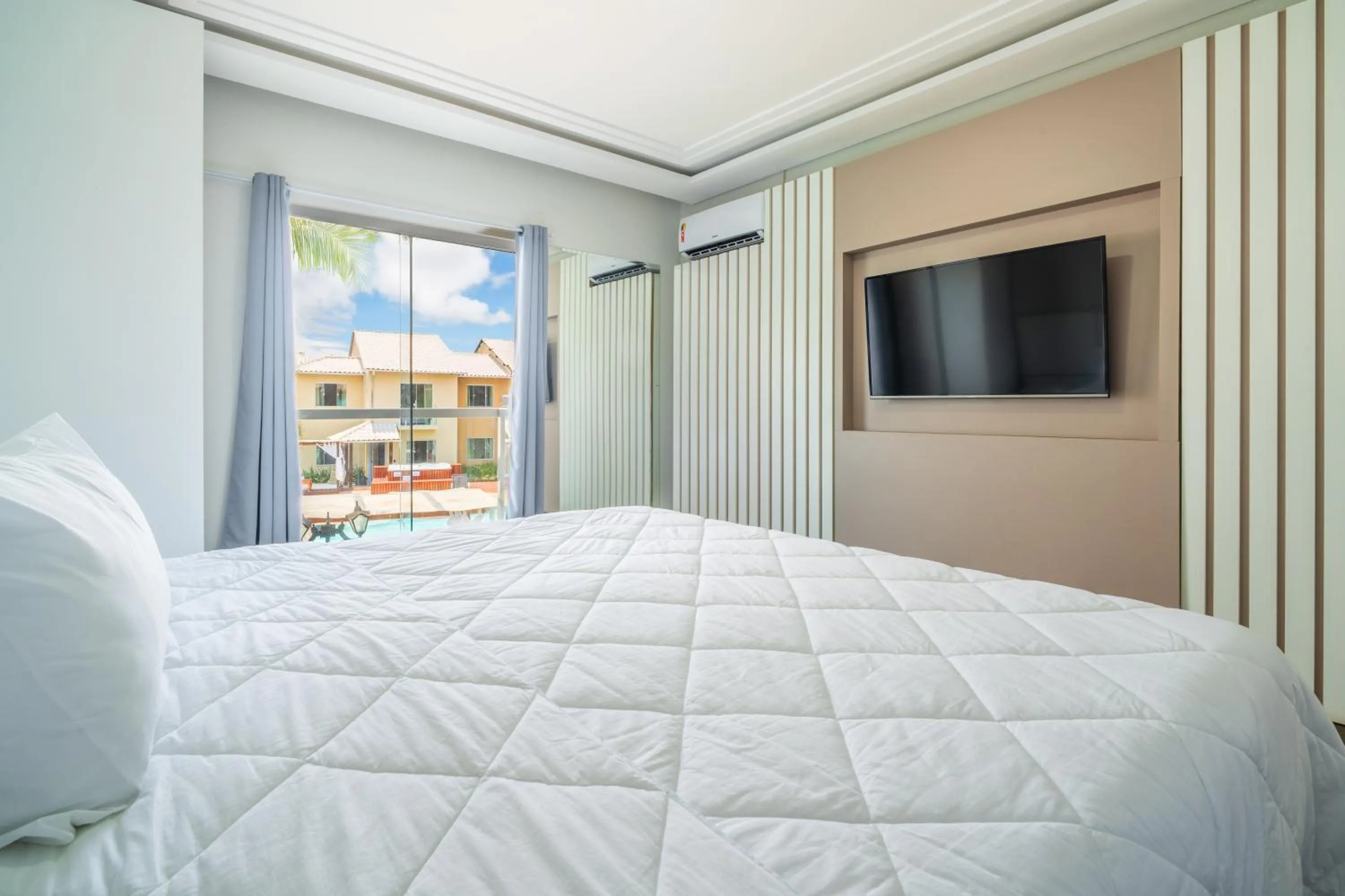 Bed in Pousada Villa del Sol