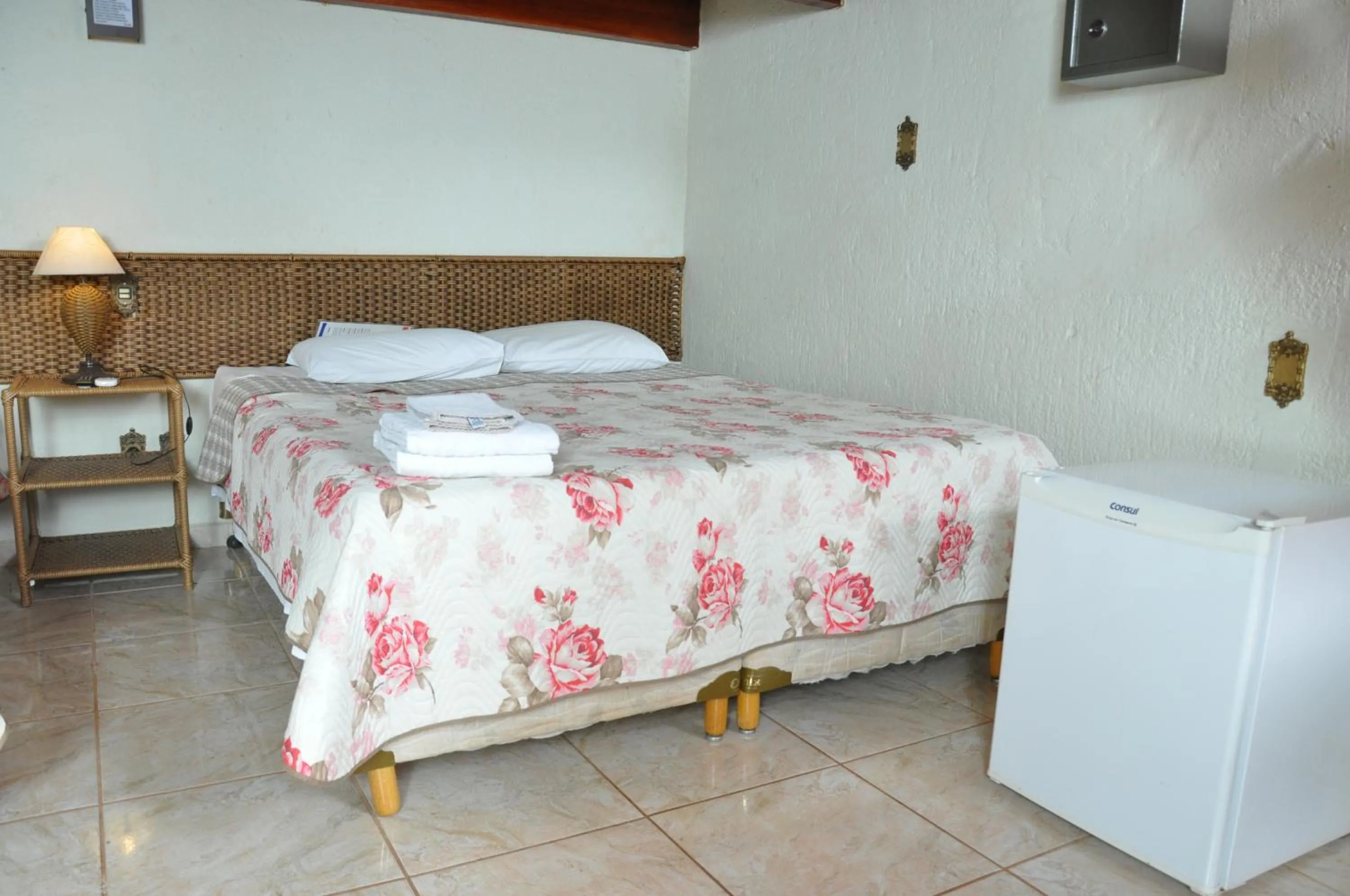 Bed in Pousada Beco da Lua