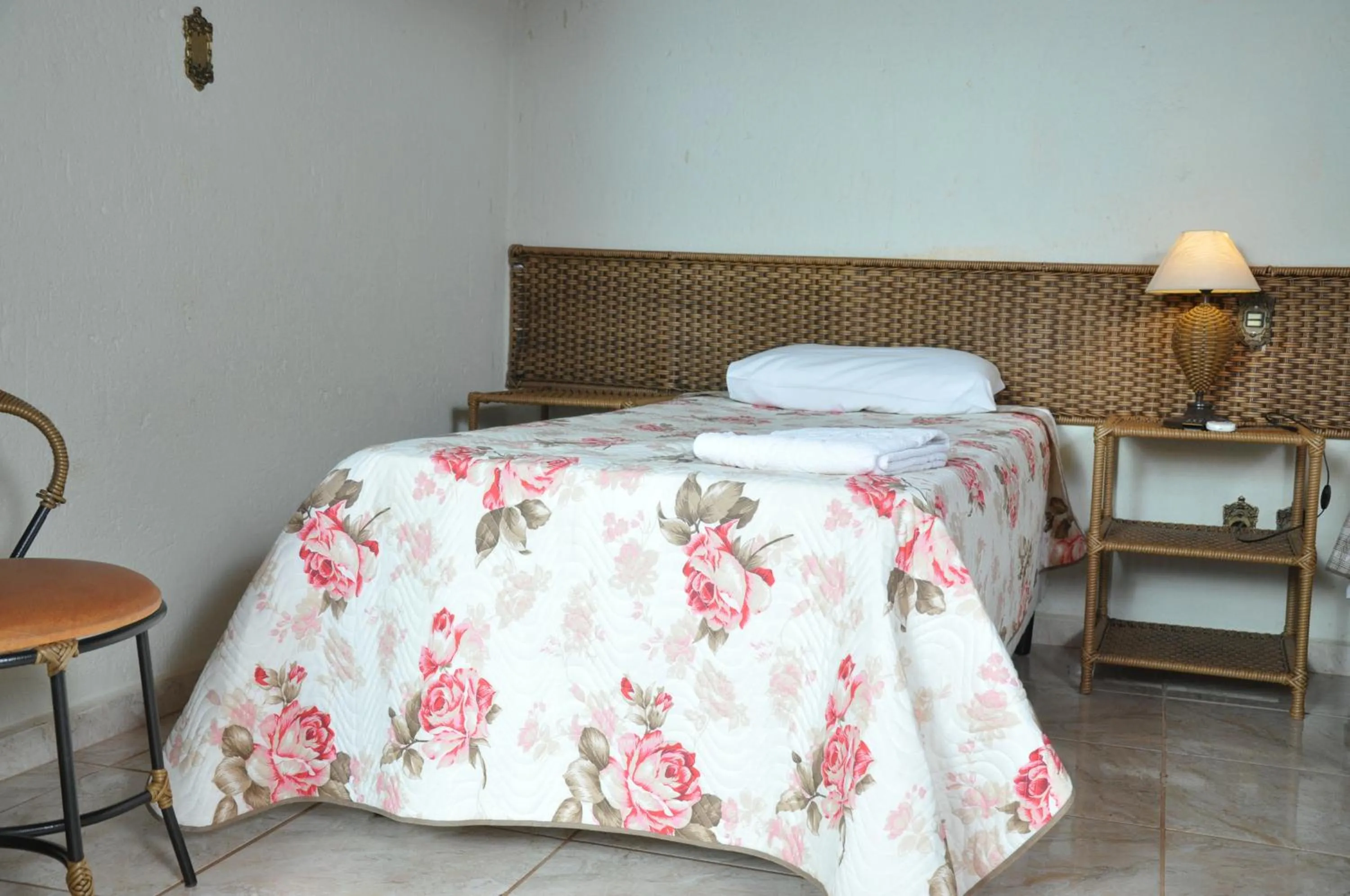 Bed in Pousada Beco da Lua