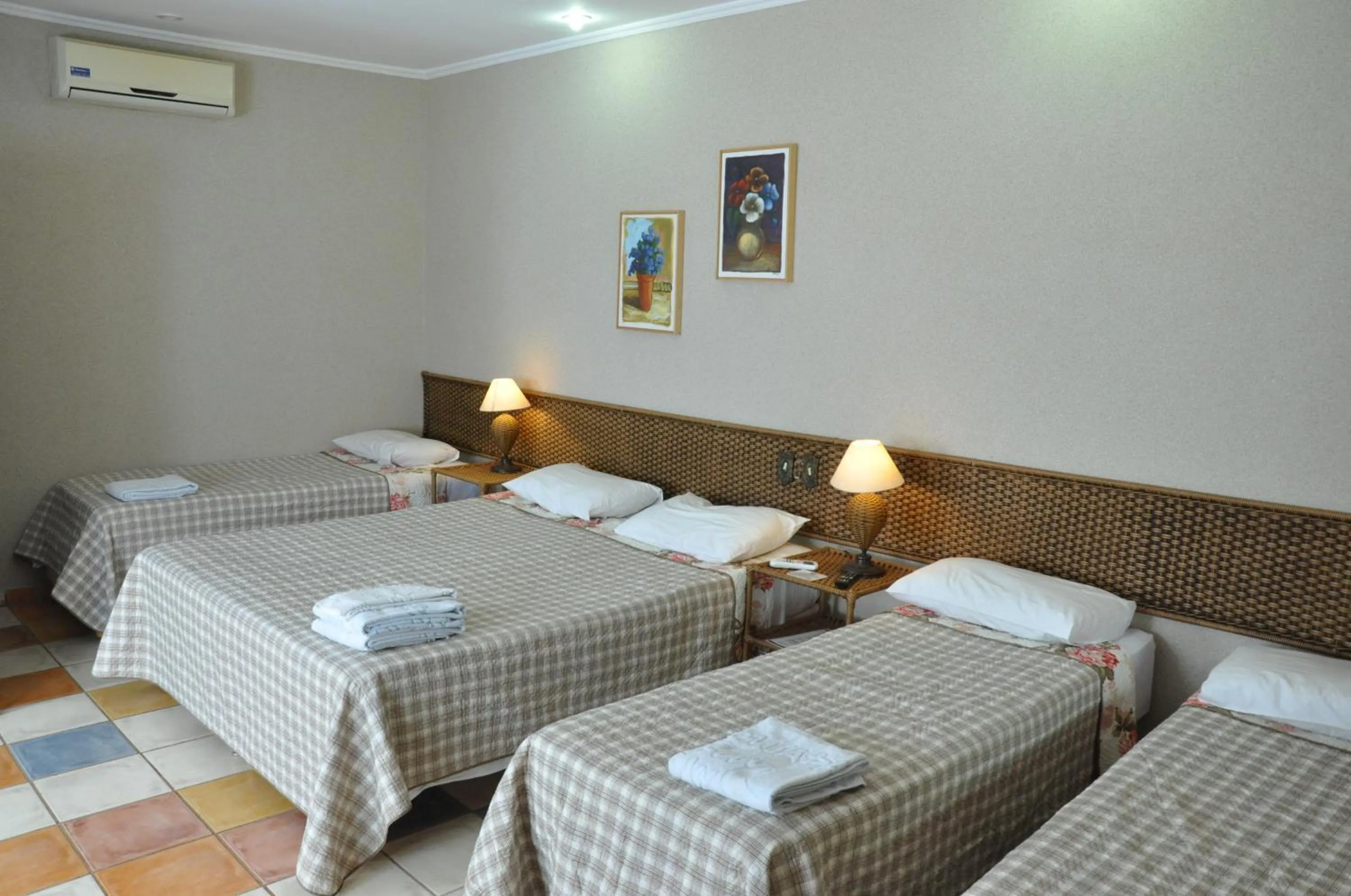 Bed in Pousada Beco da Lua