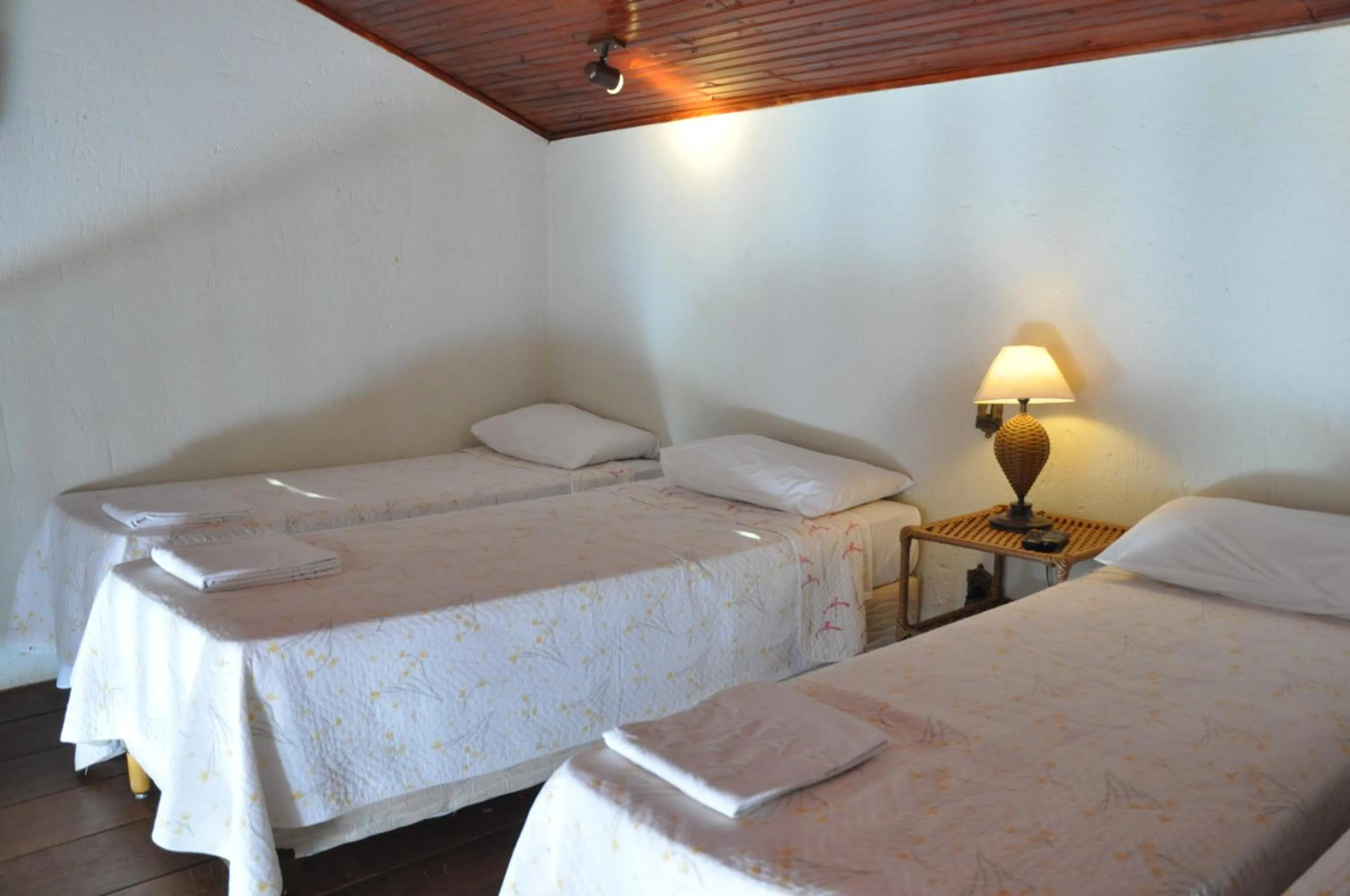 Bed in Pousada Beco da Lua