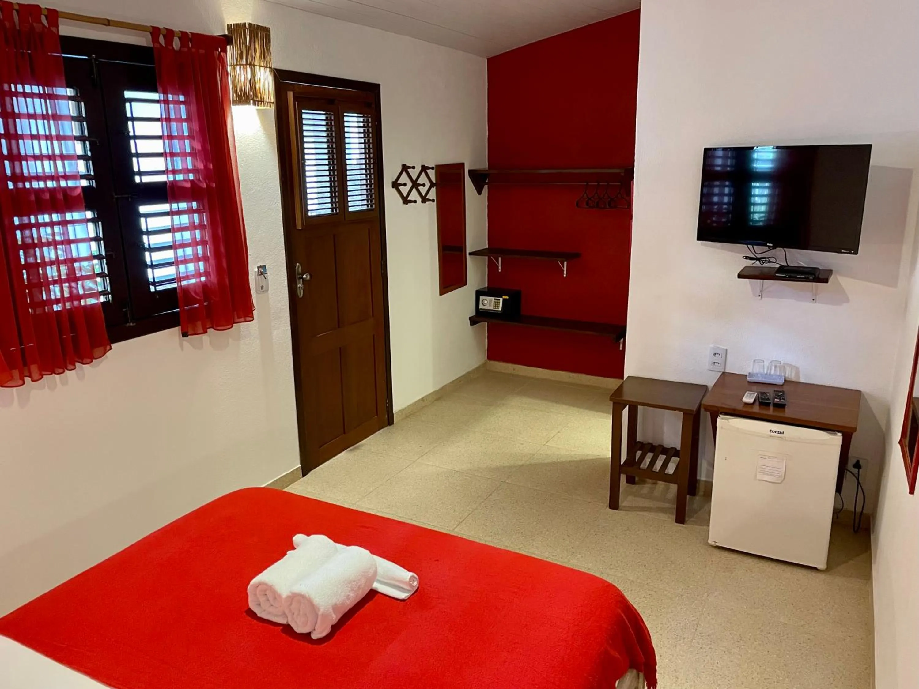 Bed in Pousada Atlantis