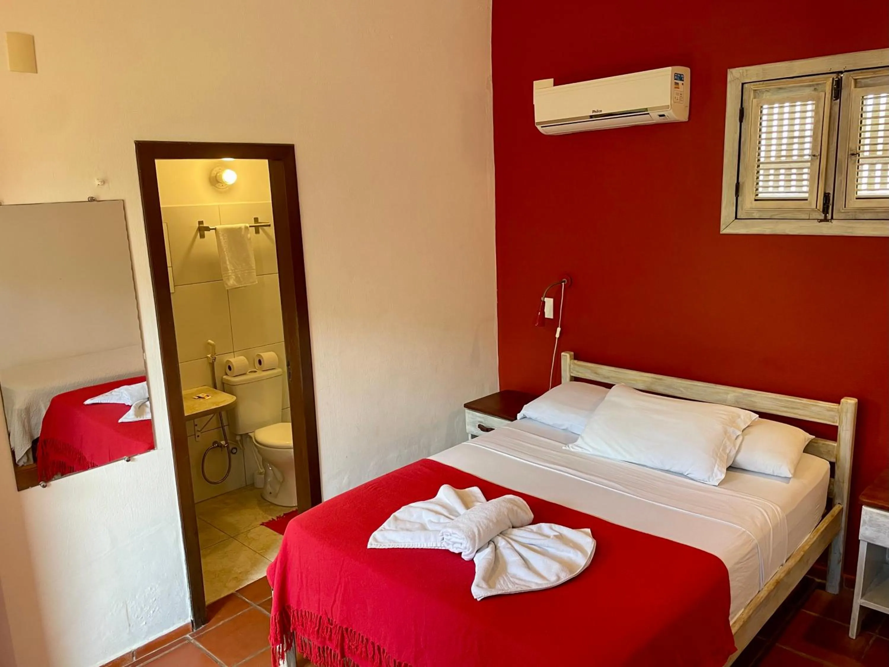 Bed in Pousada Atlantis