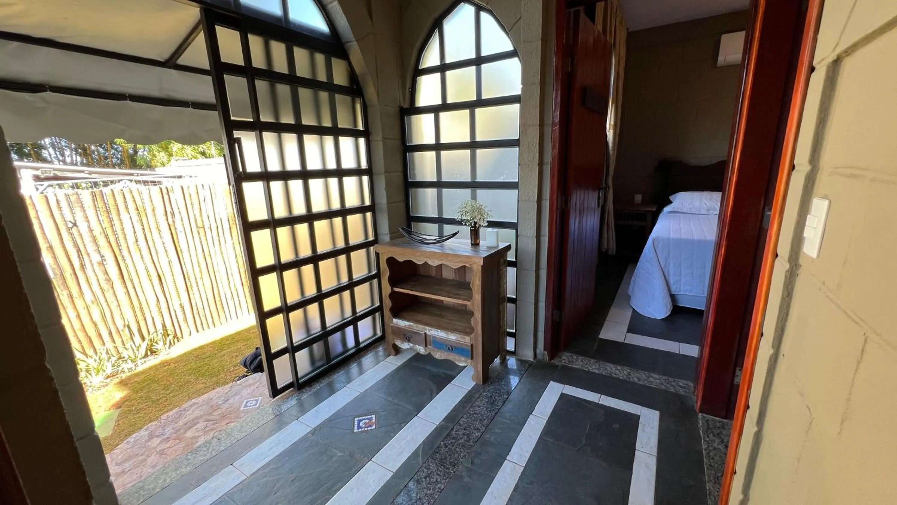 Bed in Pousada Camelot Inn