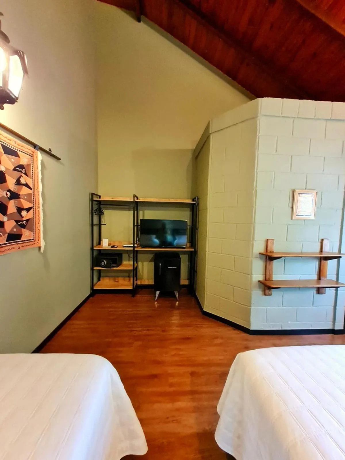 Bedroom, Bed in Pousada Camelot Inn