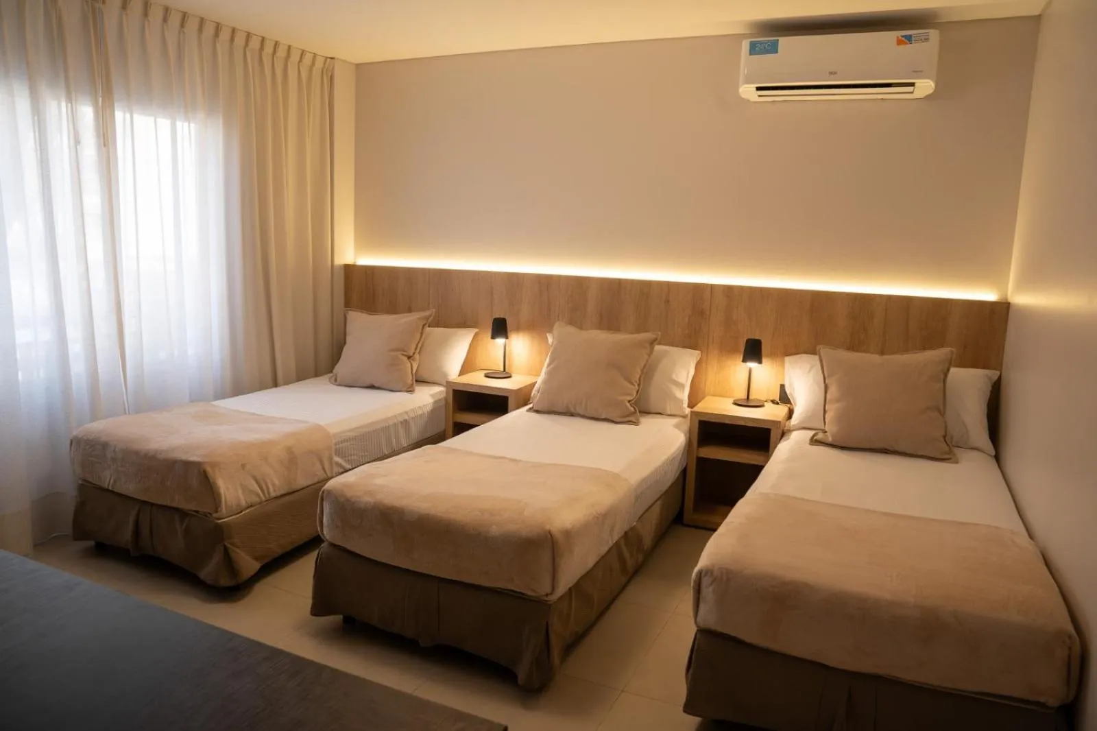 Bed in Urbana Suites