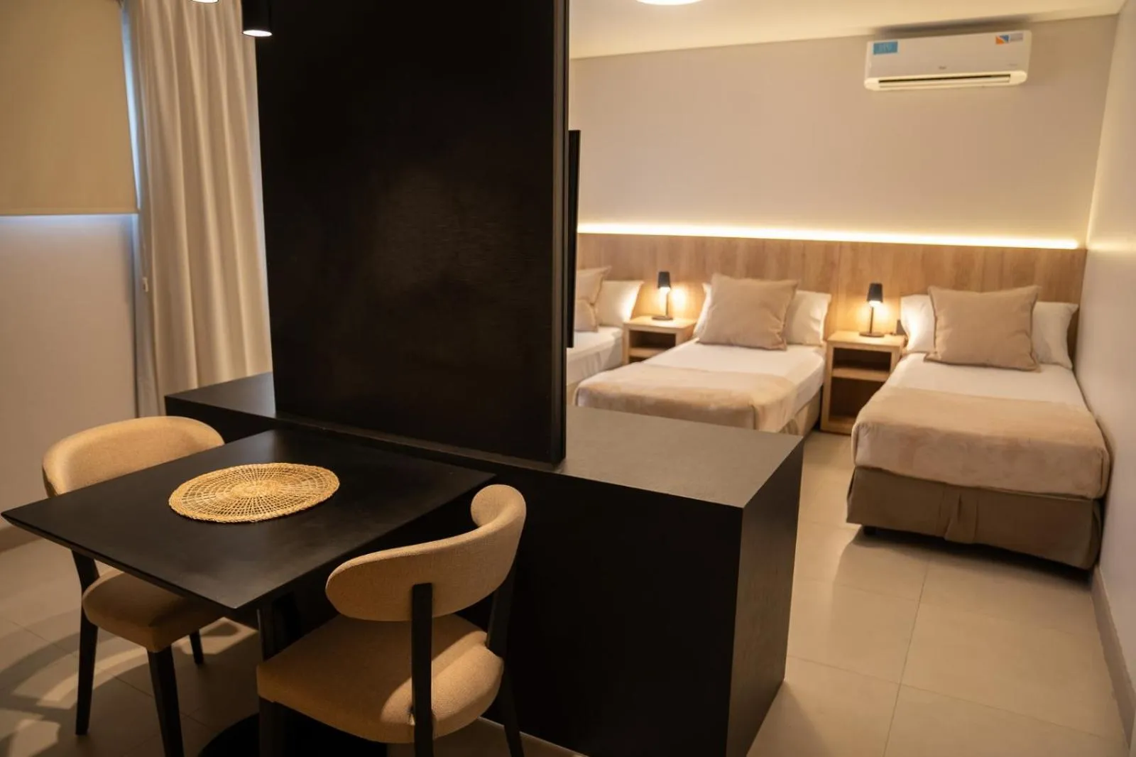 Bed in Urbana Suites