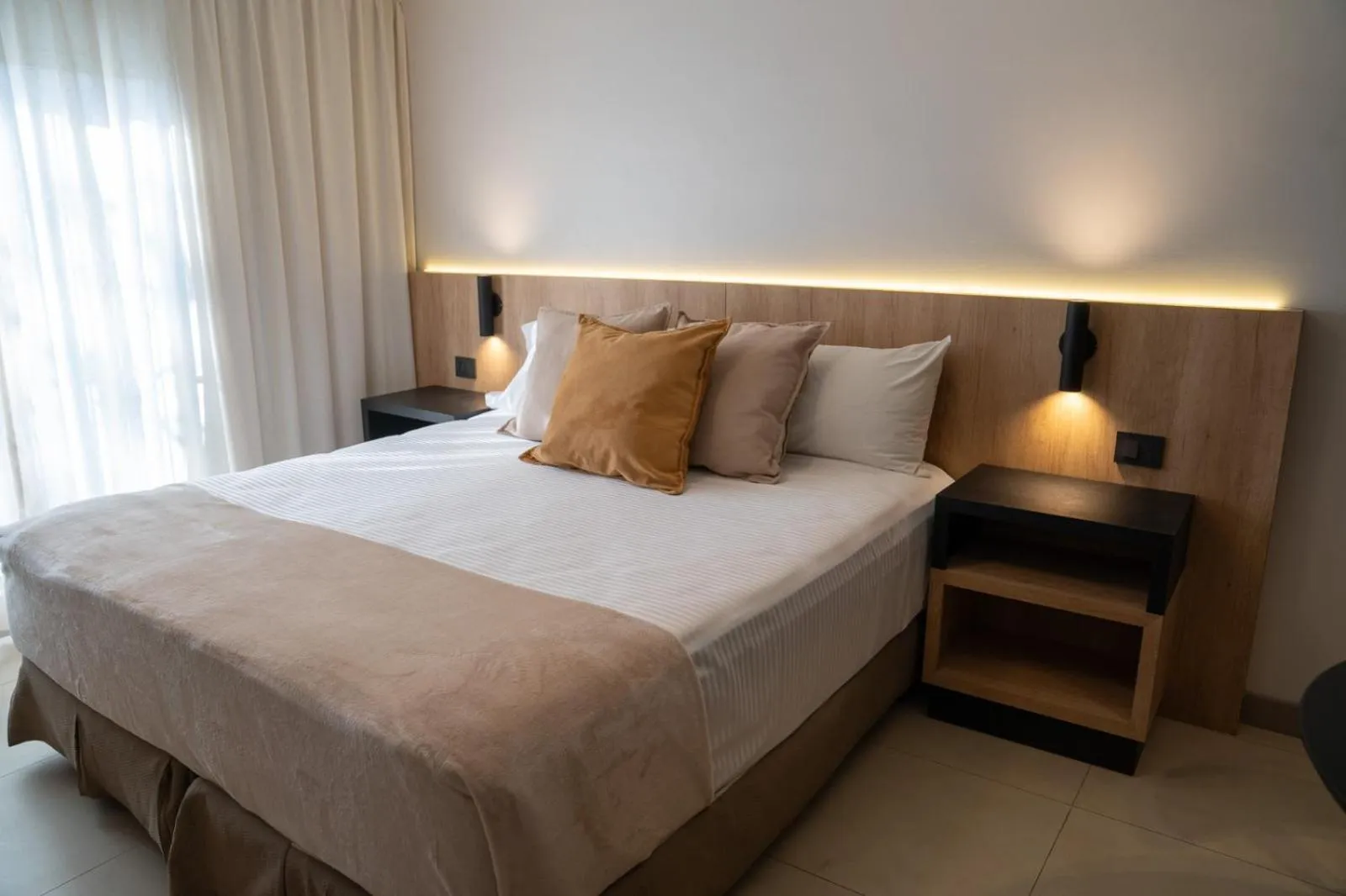 Bed in Urbana Suites