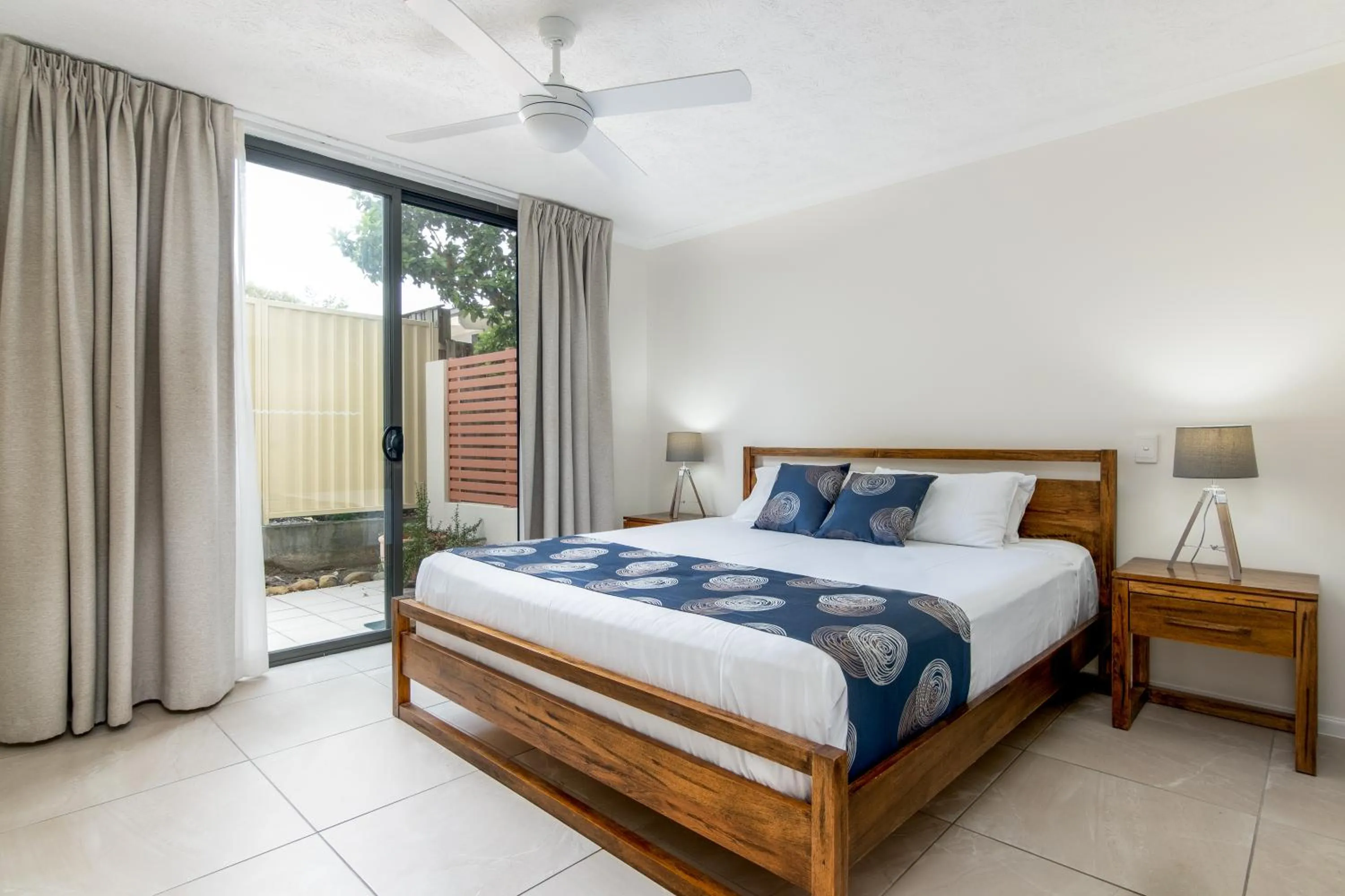 Patio, Bed in The Village Holiday Apartments at Burleigh Heads