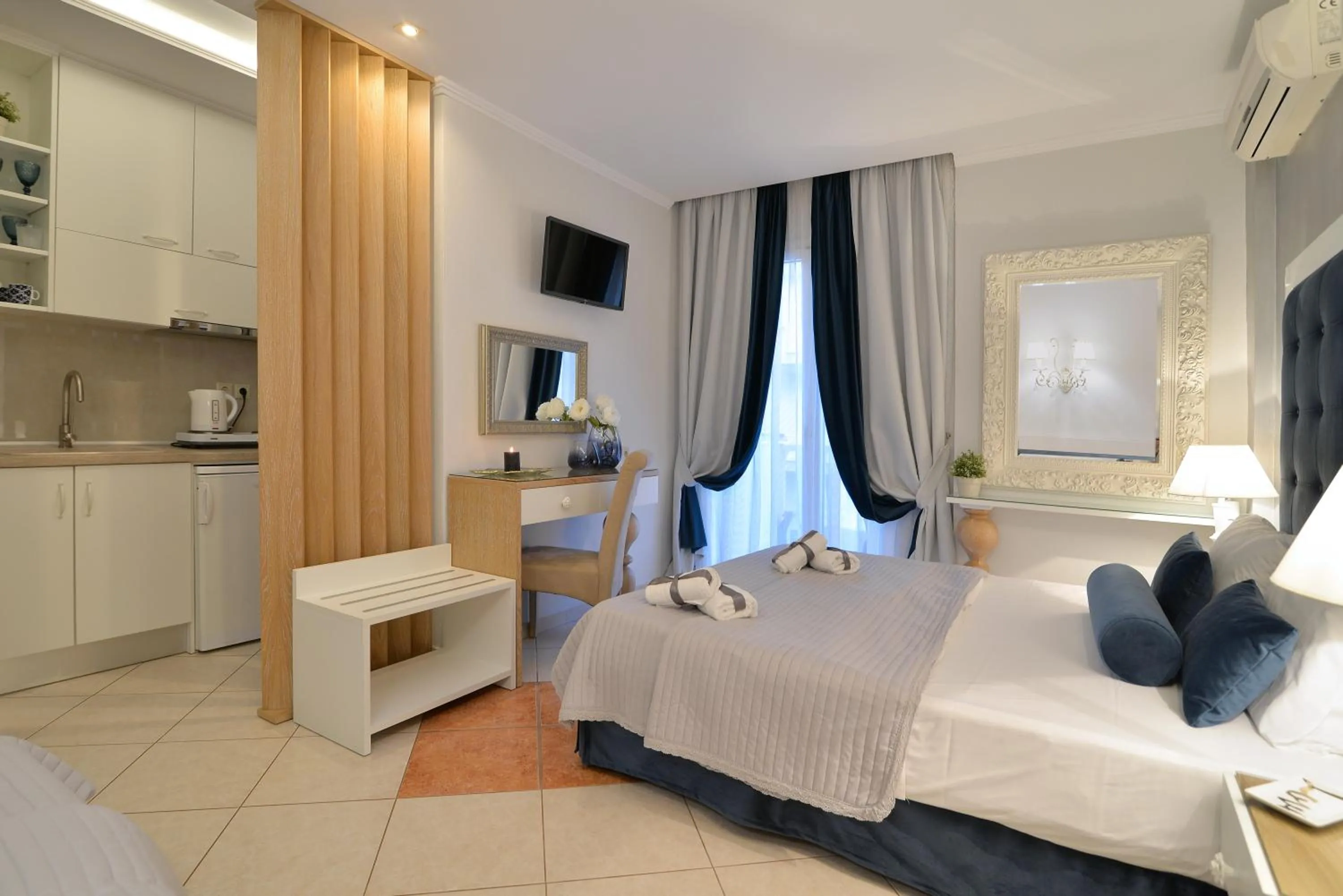 Bed in Epavlis Luxury apts