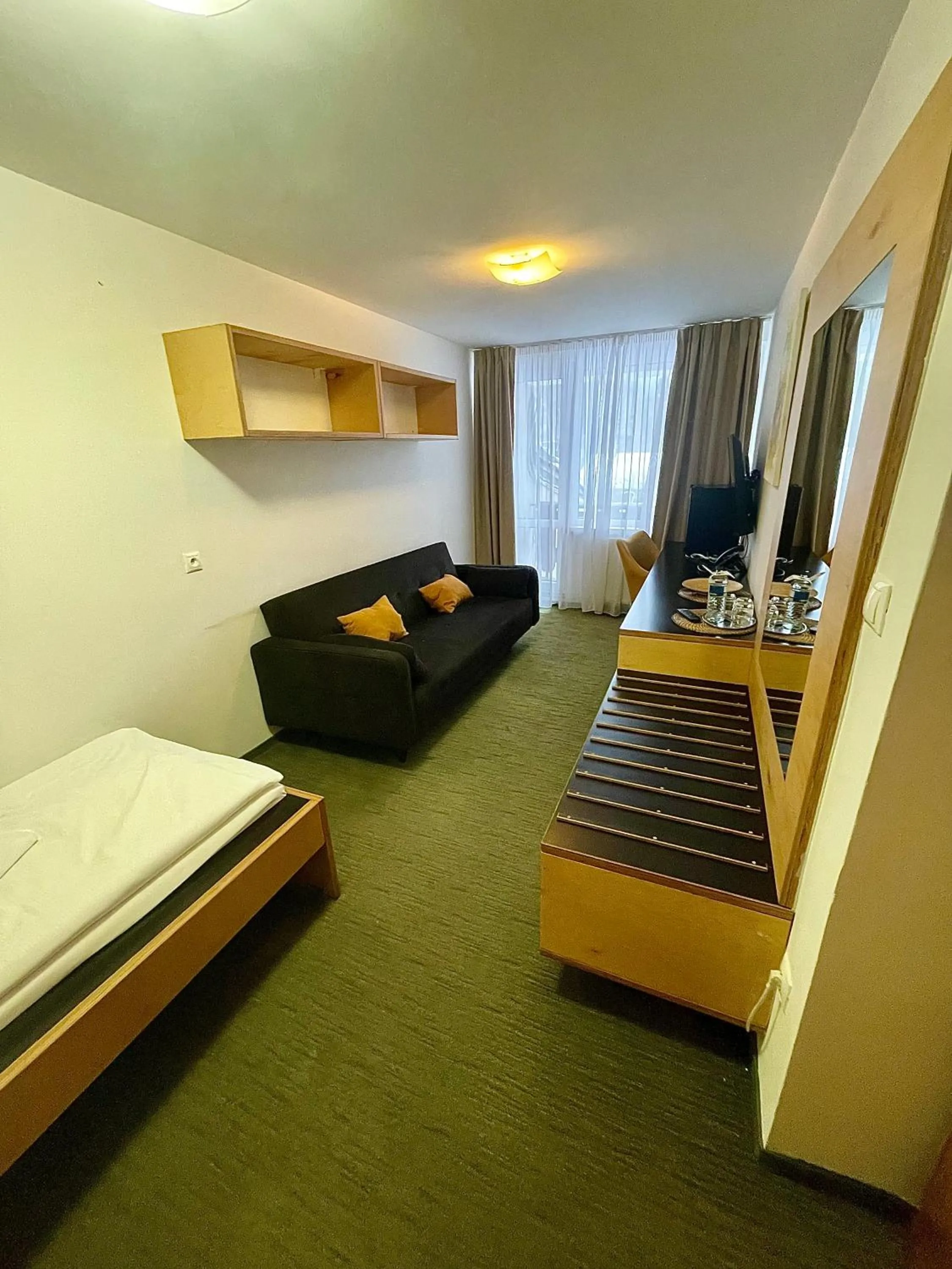 Living room, Bed in Hotel Diery