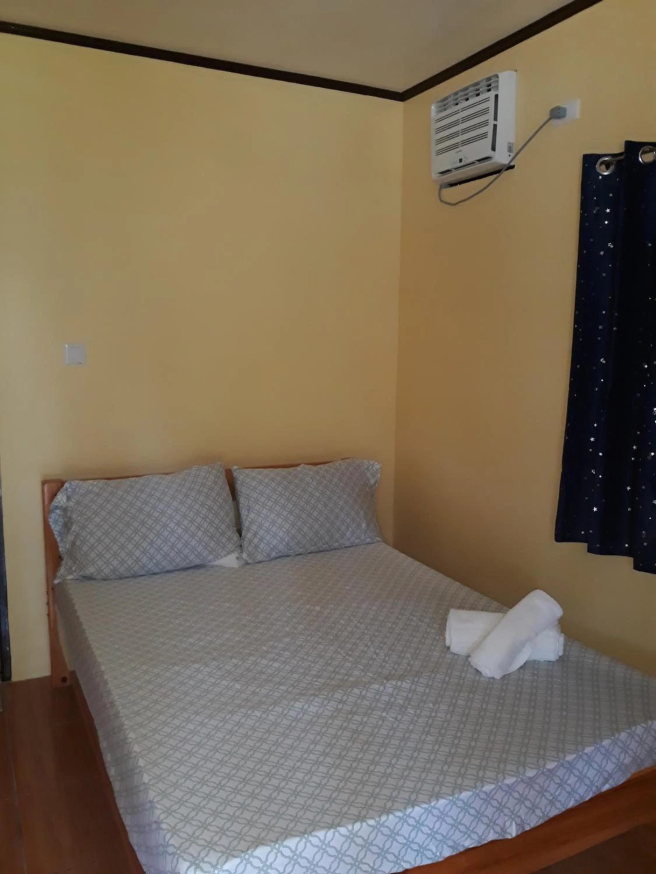 Photo of the whole room, Bed in Gardenview Homestay Siargao