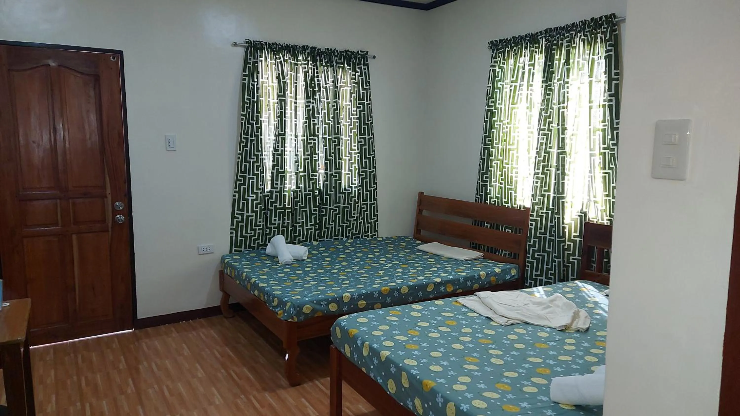 Photo of the whole room, Bed in Gardenview Homestay Siargao