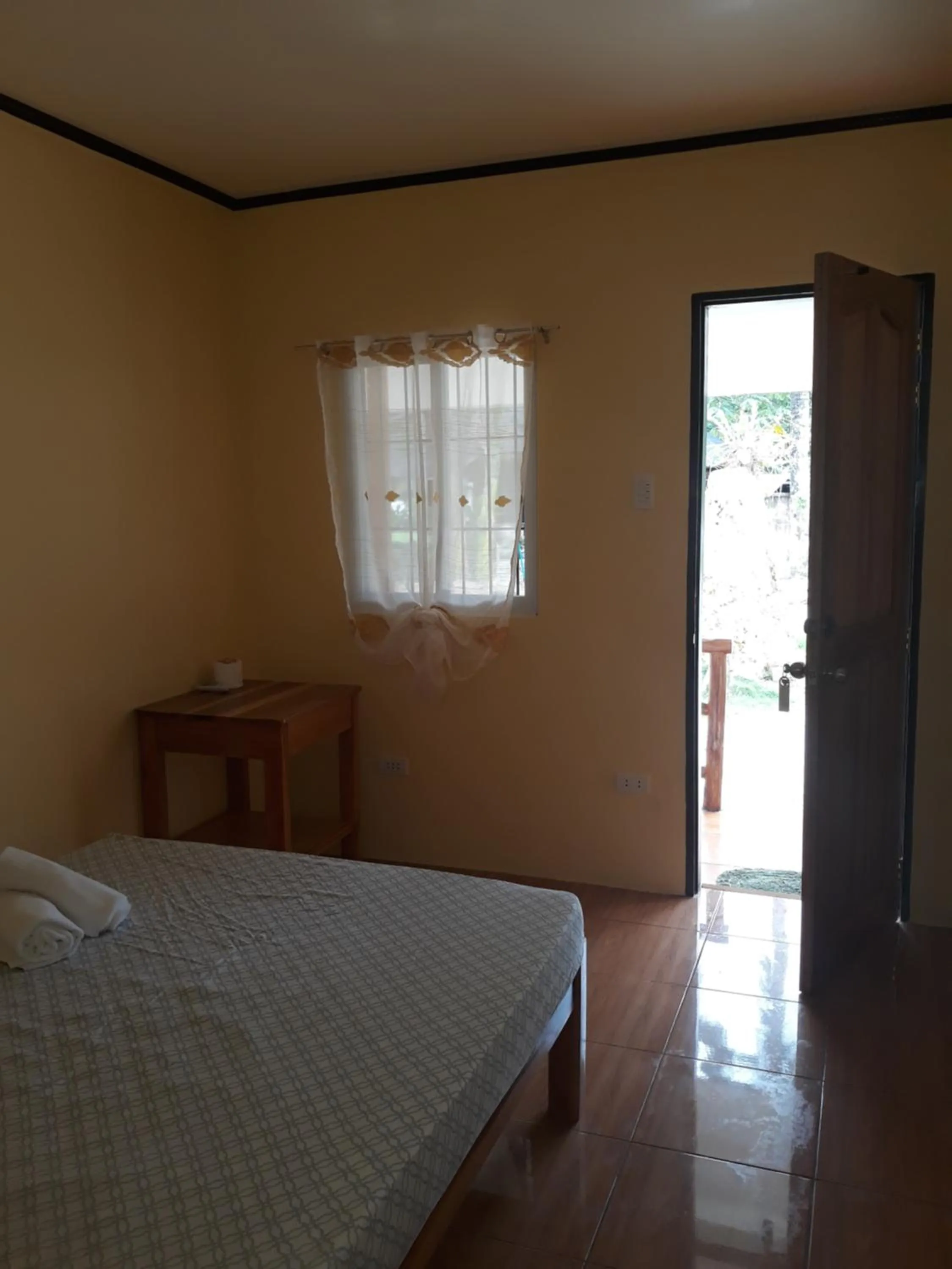 Photo of the whole room, Bed in Gardenview Homestay Siargao