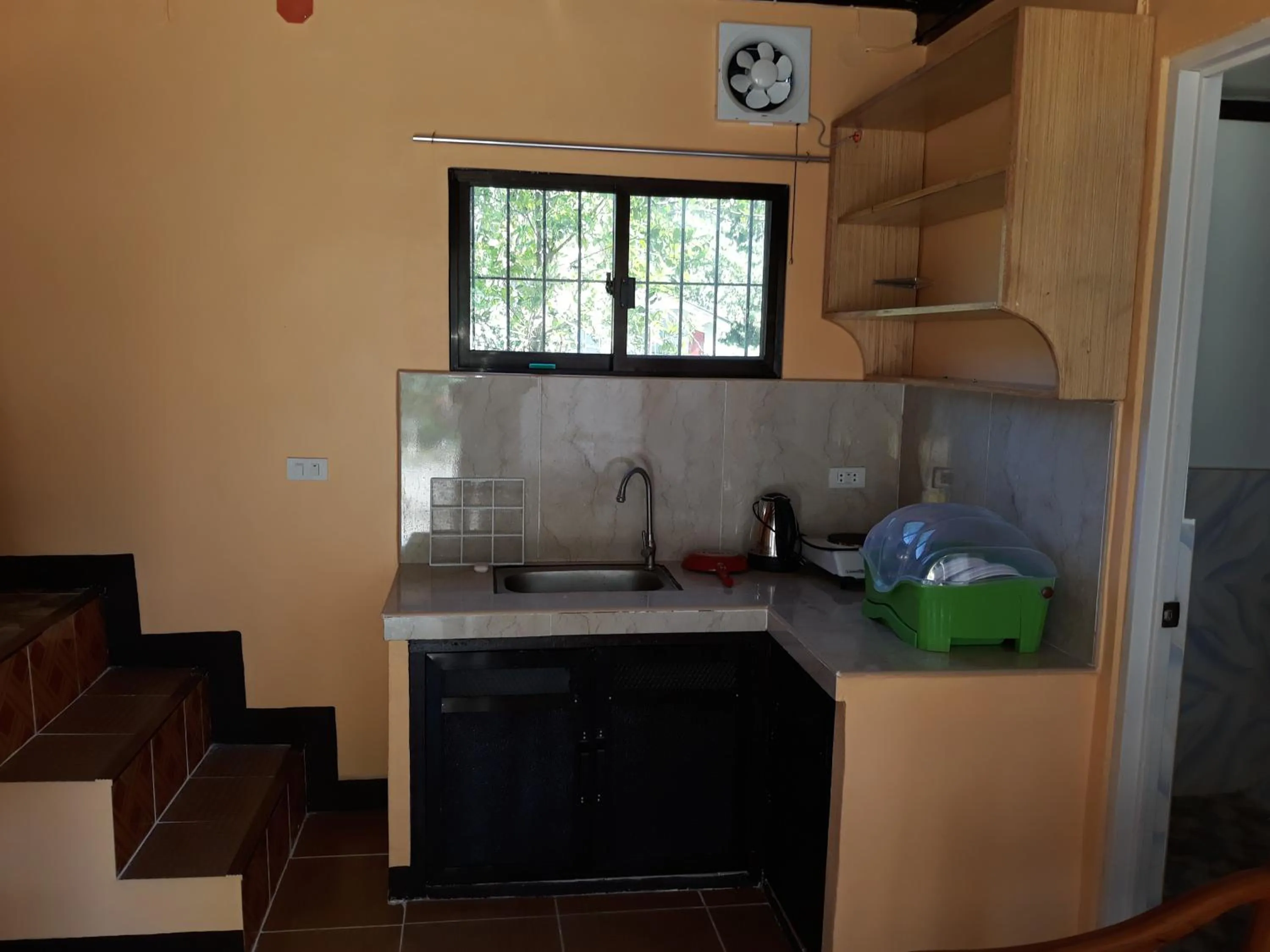 Kitchen or kitchenette in Gardenview Homestay Siargao