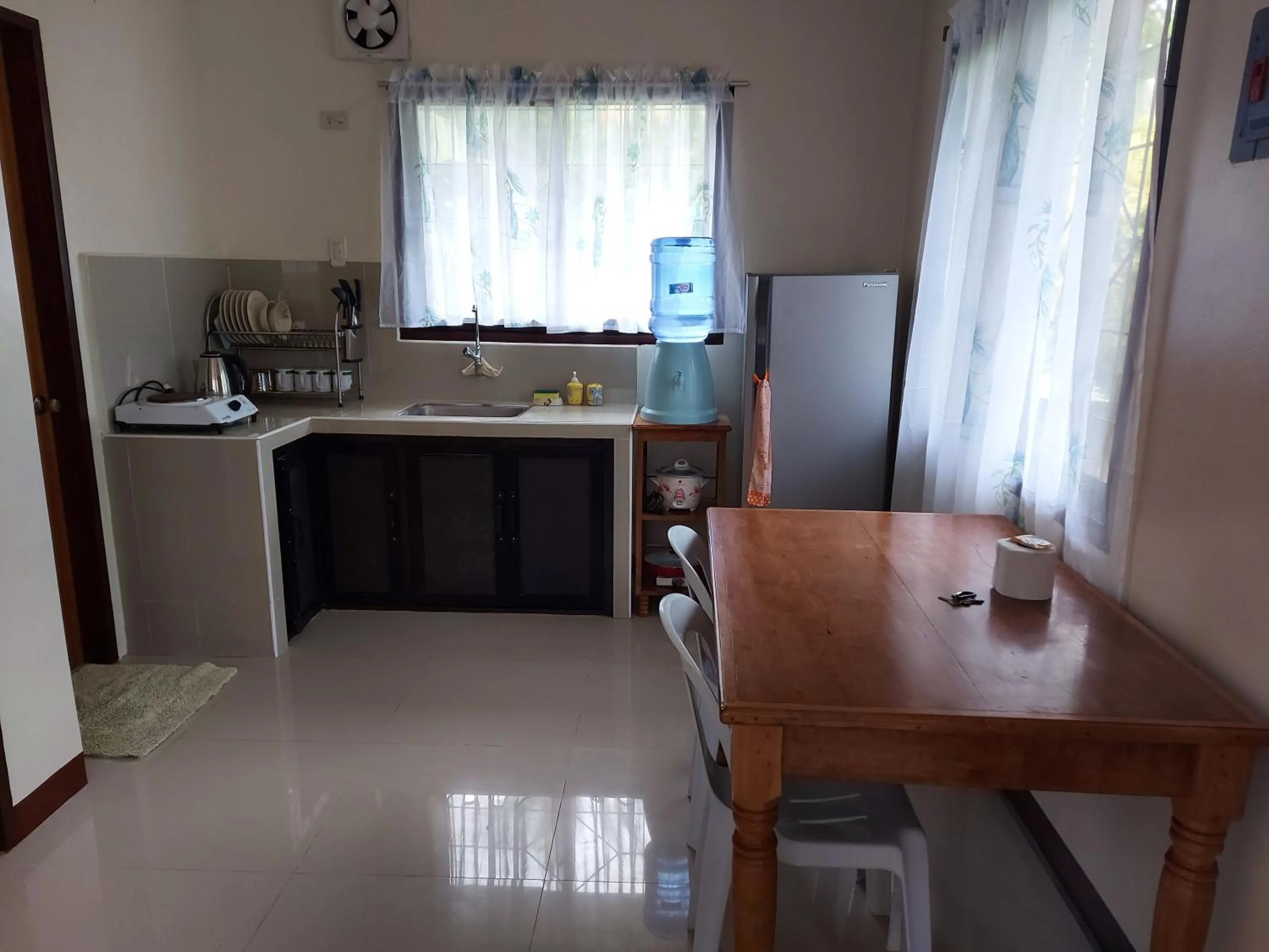 Kitchen or kitchenette in Gardenview Homestay Siargao
