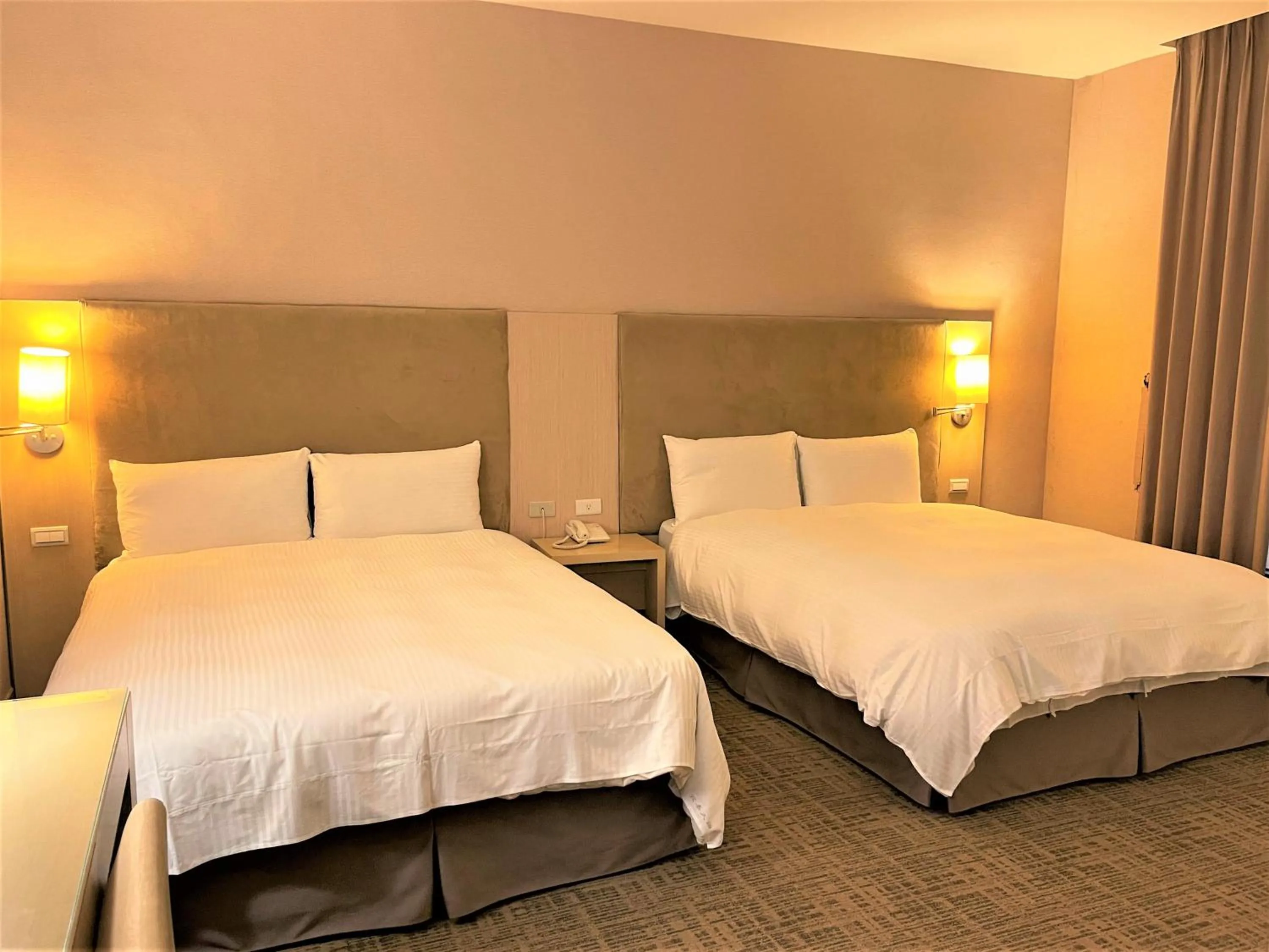 Bed in Kavalan Hotel