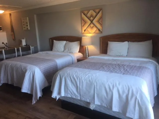 Bedroom, Bed in The Waterfront Suites and Marina