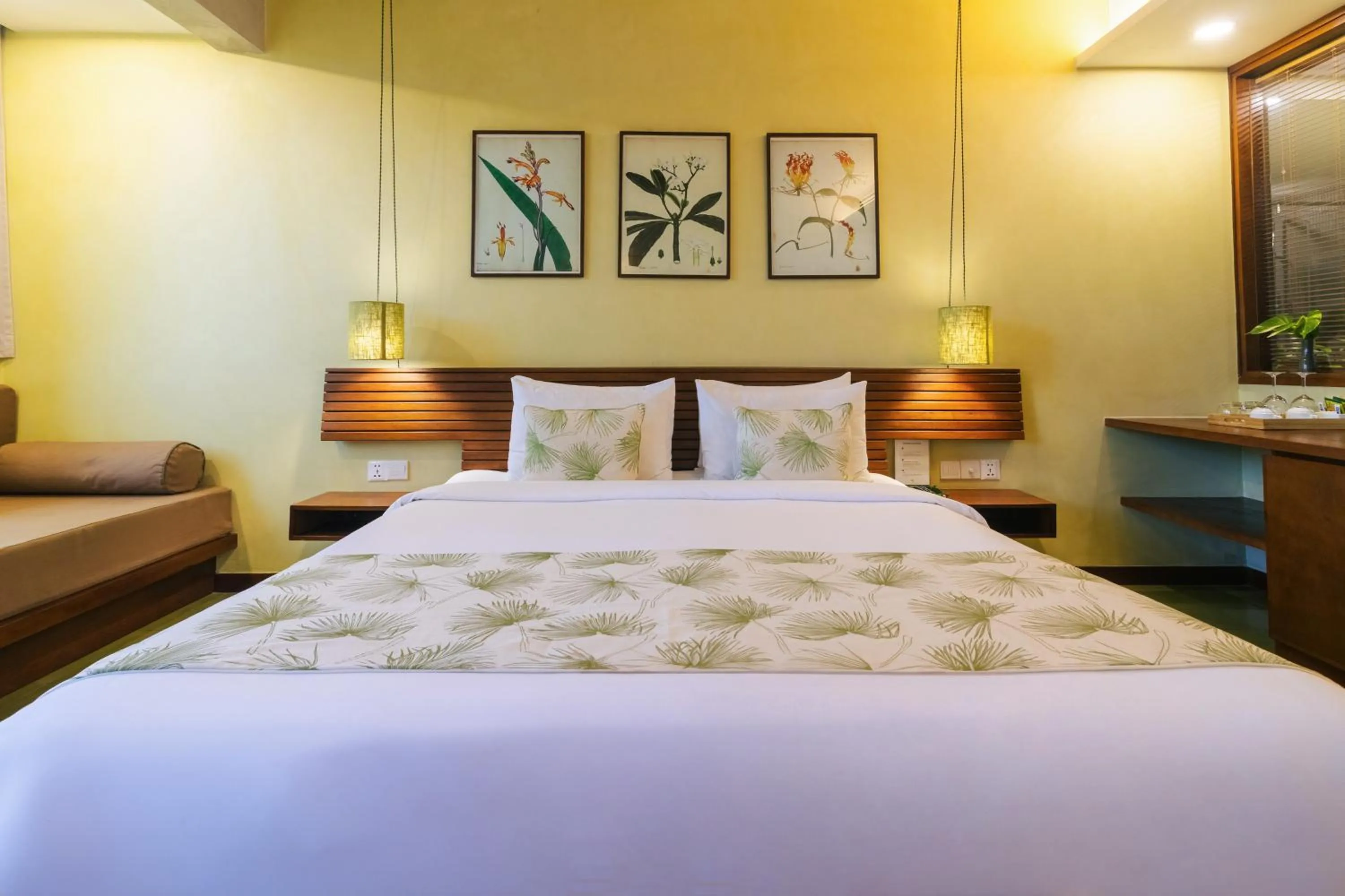 Bed in Penh House Hotel