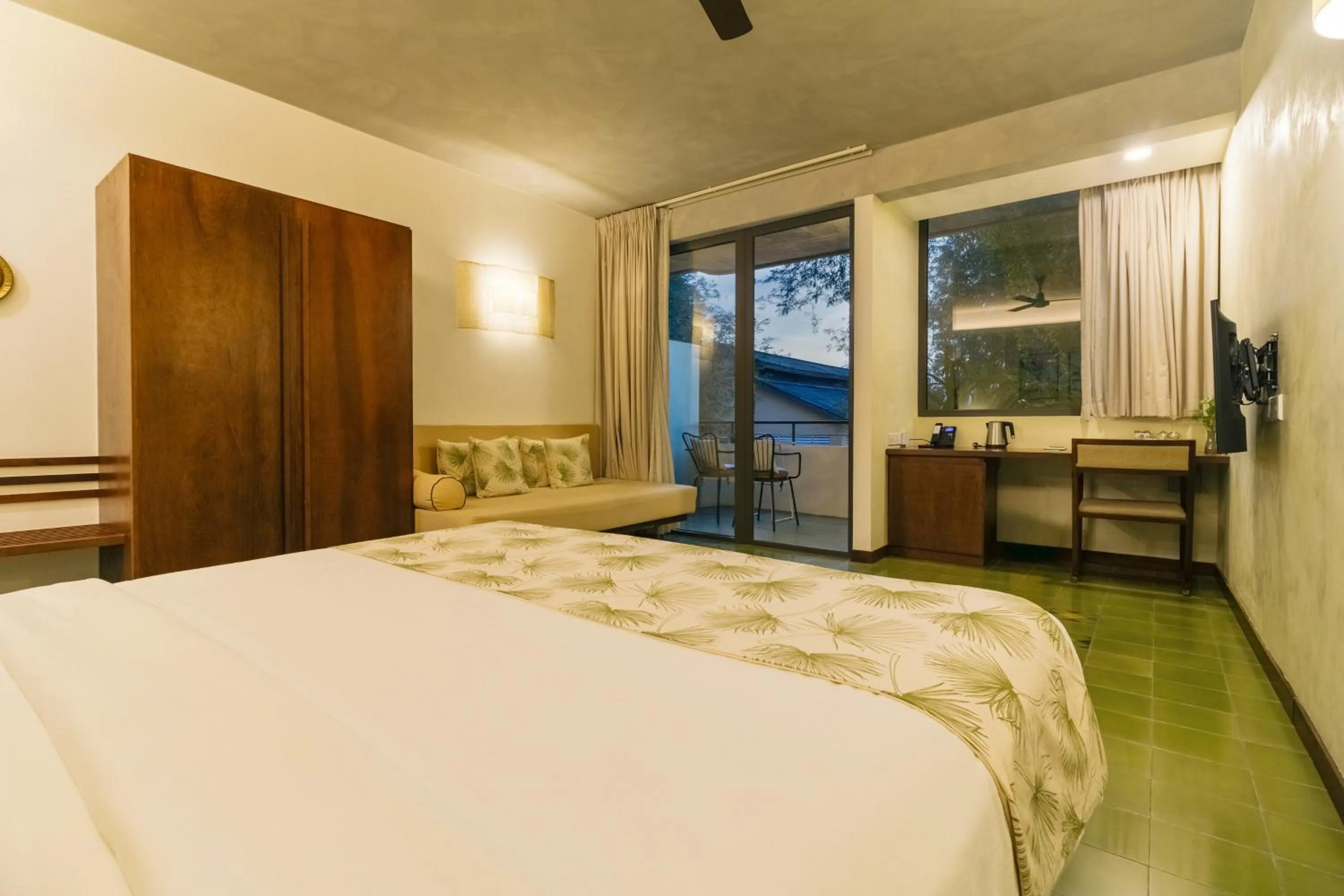 Bed in Penh House Hotel