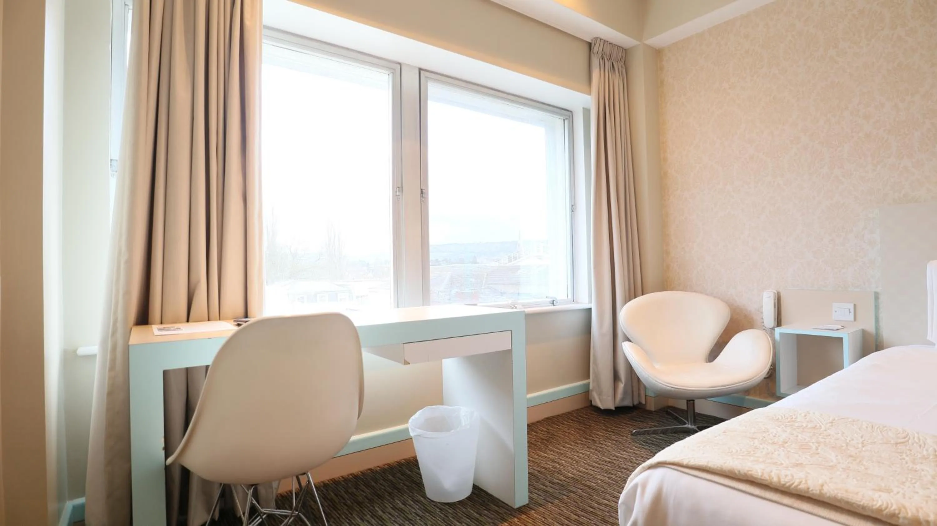 Seating area in Citrus Hotel Cheltenham by Compass Hospitality