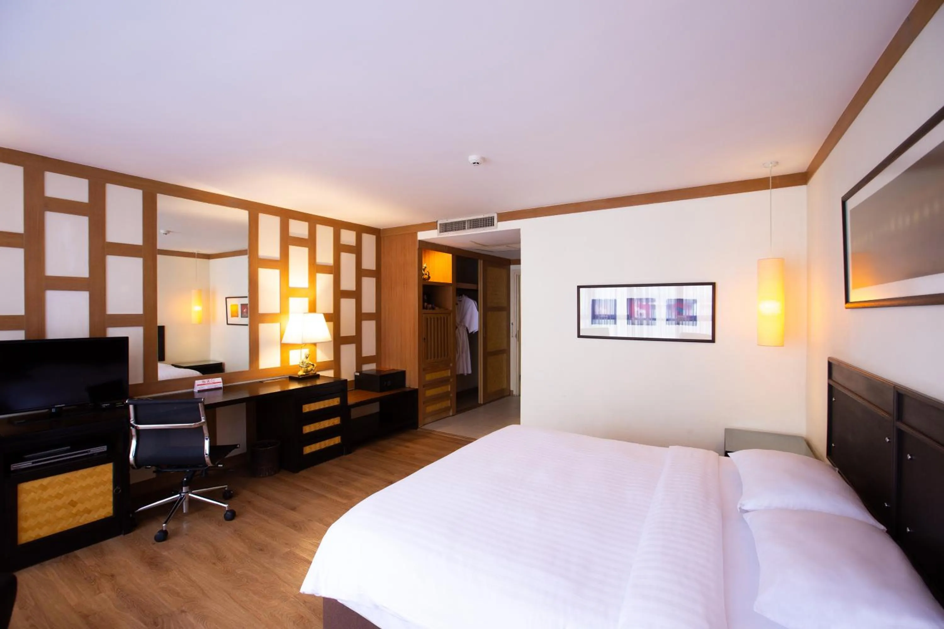 Bed in The Tarntawan Hotel Surawong Bangkok