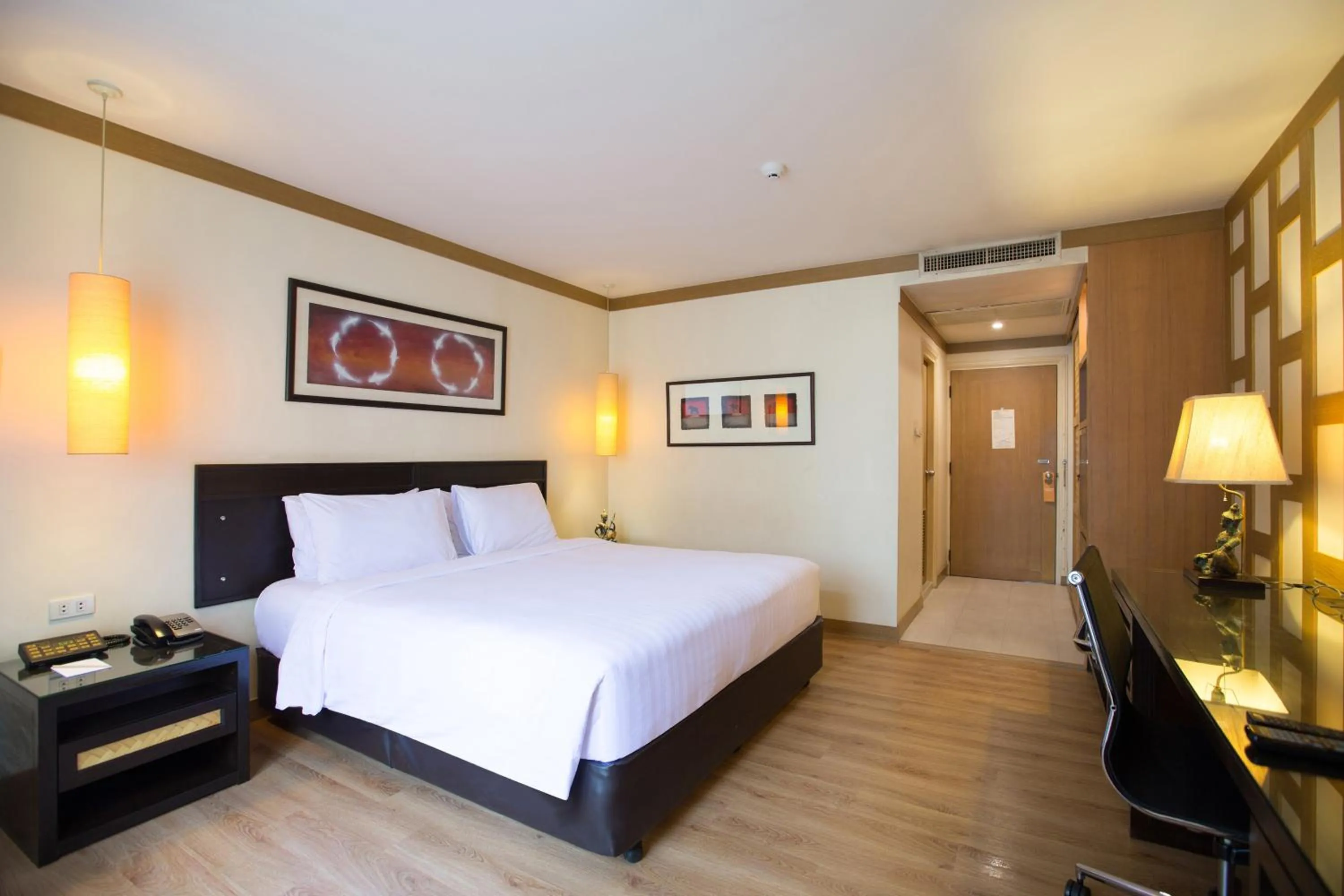 Bed in The Tarntawan Hotel Surawong Bangkok