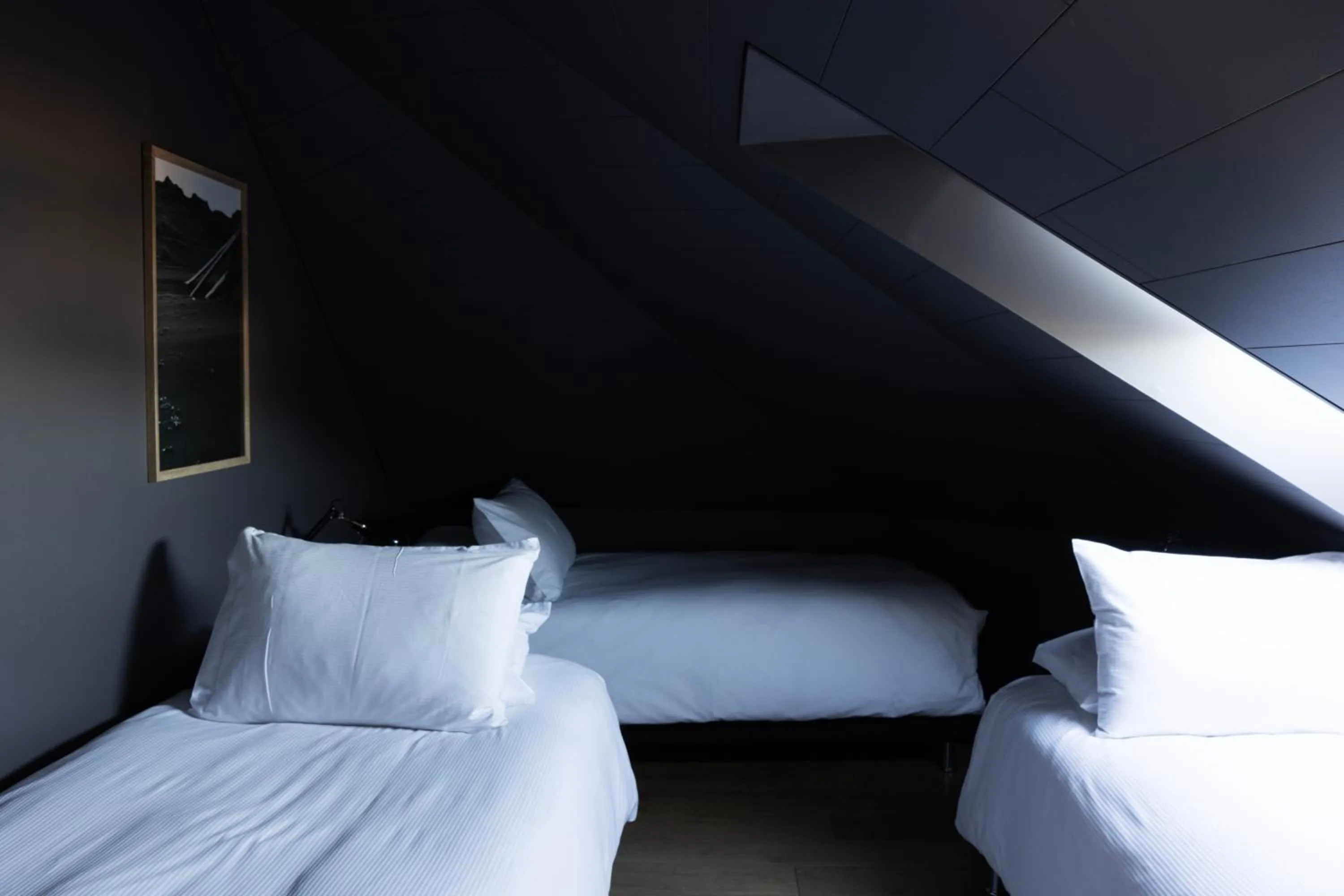 Bed in Rey Apartments