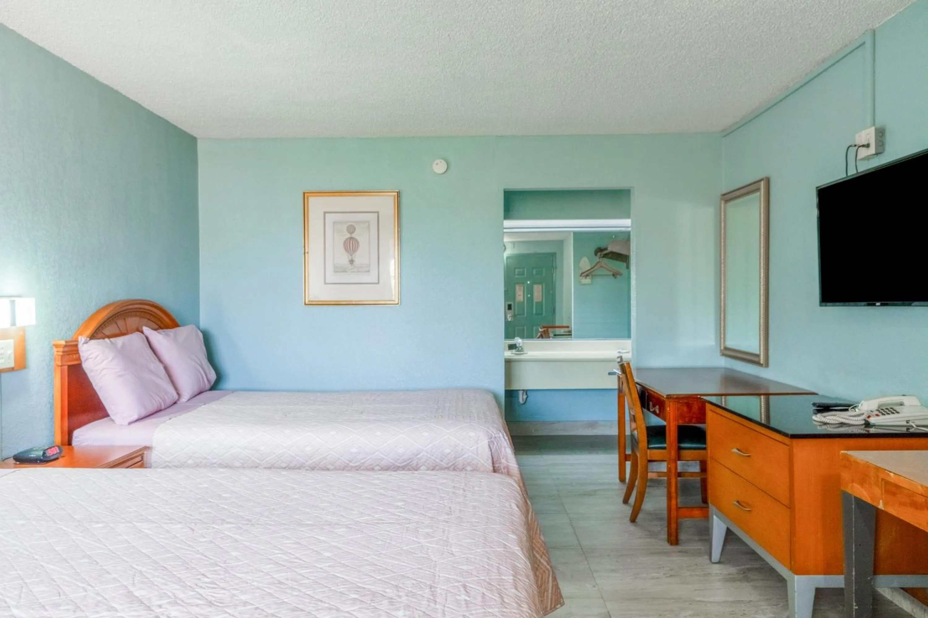 Bedroom, Bed in Lone Star Inn & Suites by OYO Harlingen TX