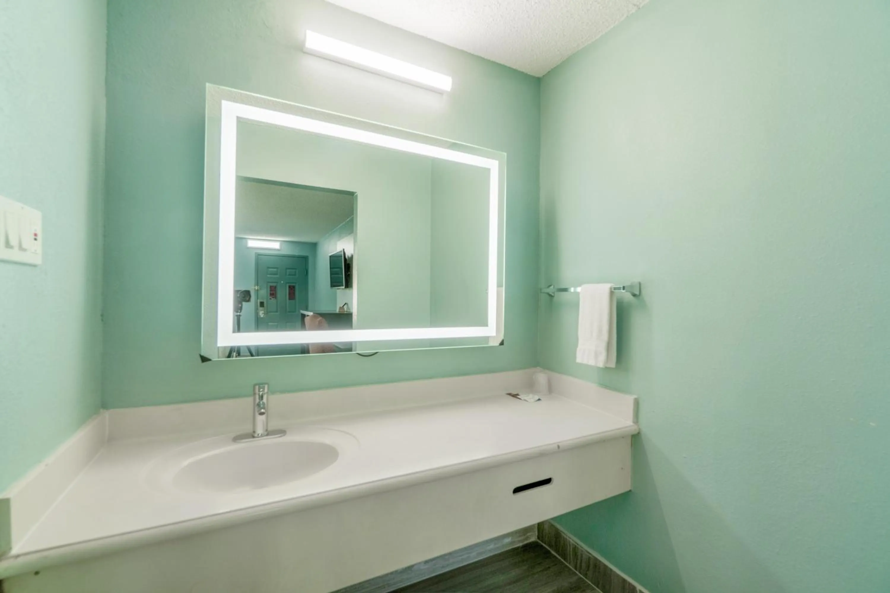Bathroom in Lone Star Inn & Suites by OYO Harlingen TX