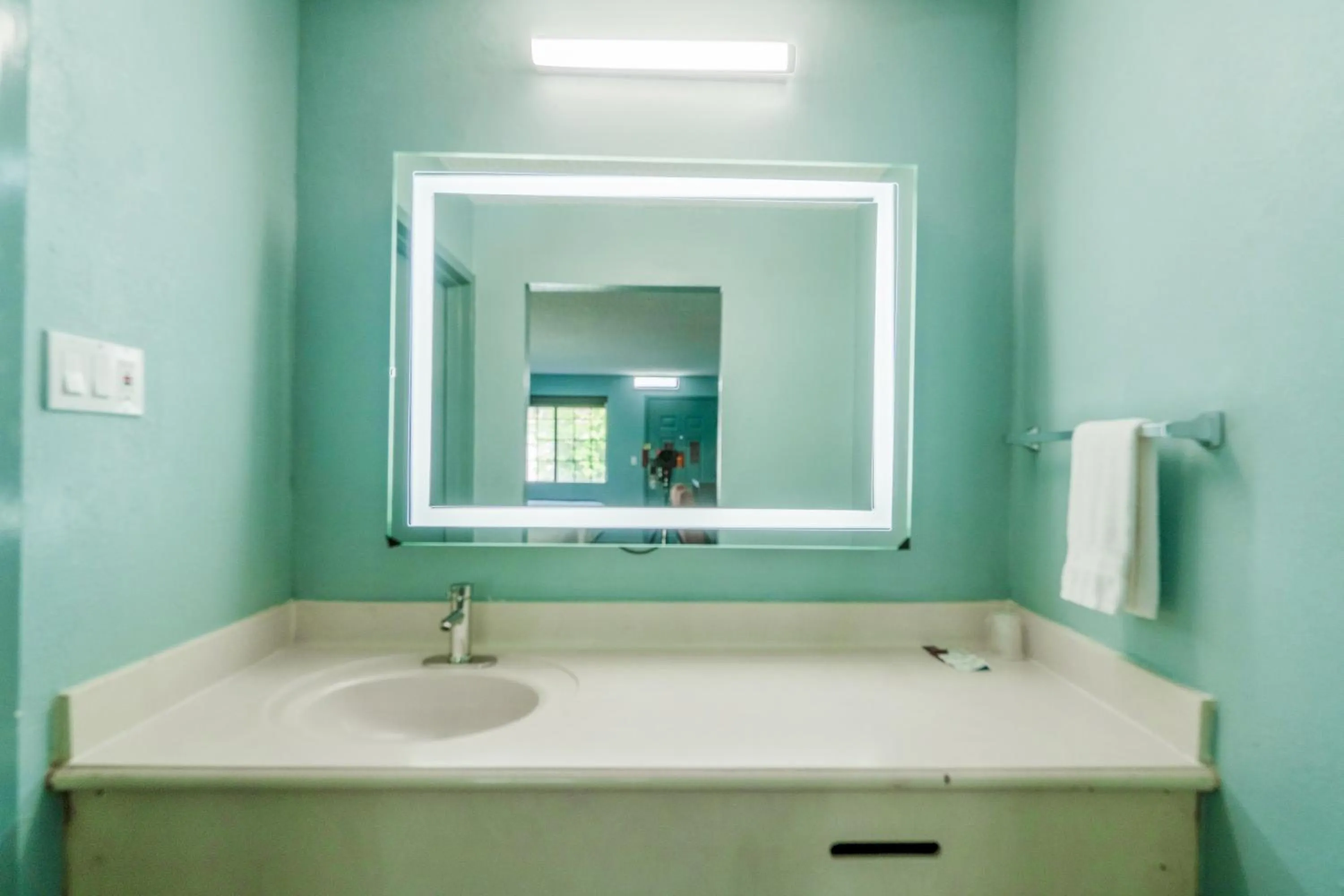 Bathroom in Lone Star Inn & Suites by OYO Harlingen TX