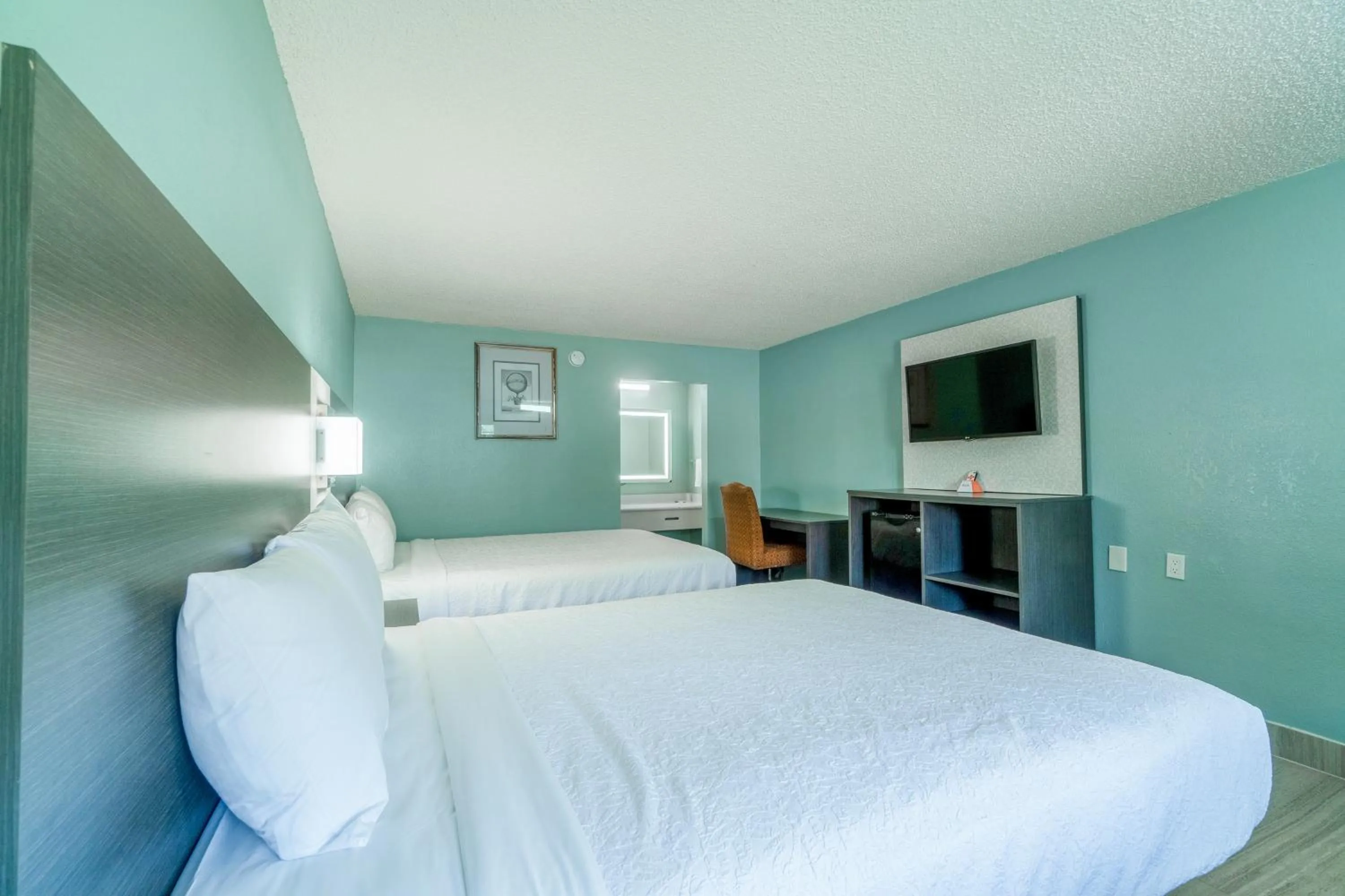 Bedroom, Bed in Lone Star Inn & Suites by OYO Harlingen TX