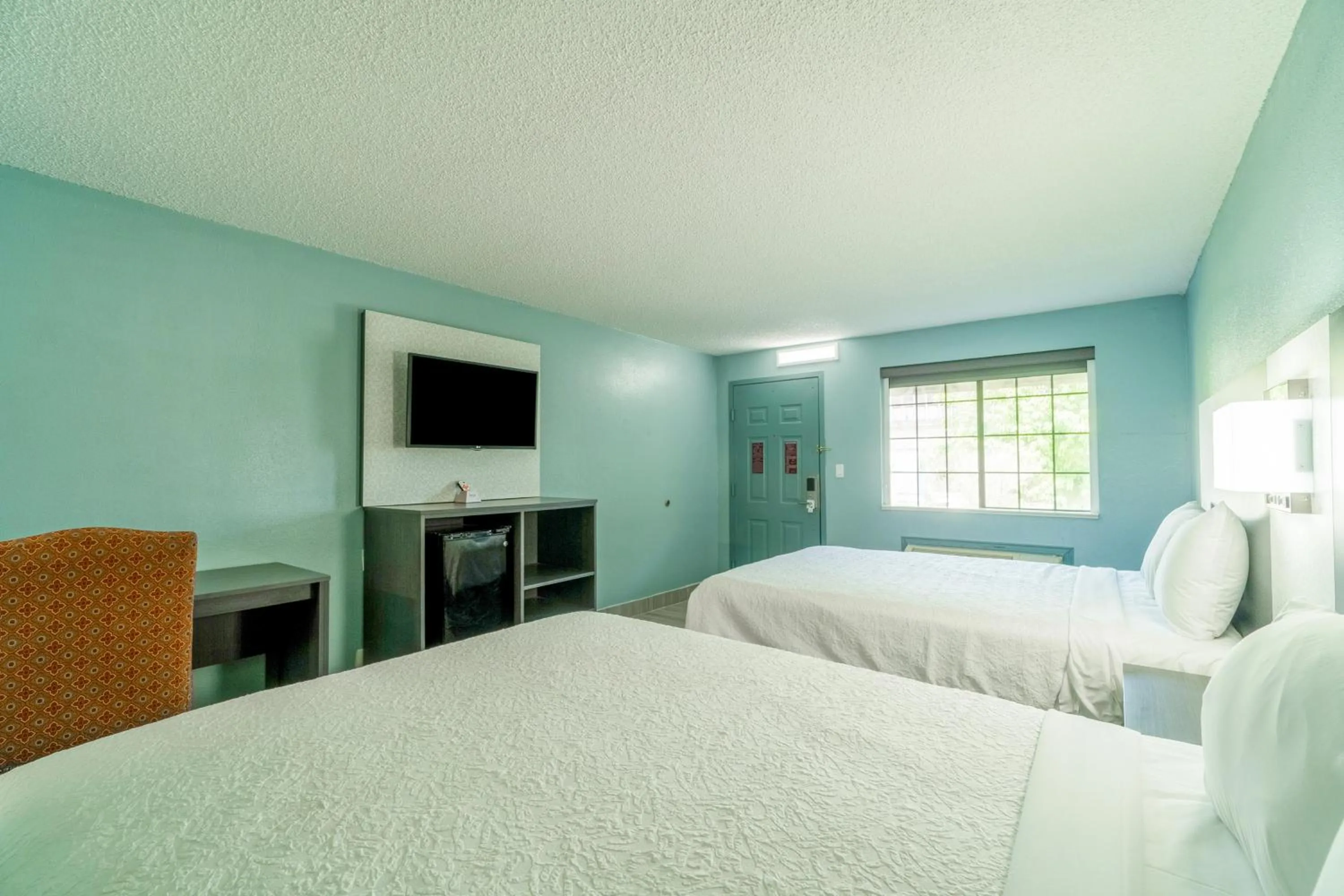 Bedroom, Bed in Lone Star Inn & Suites by OYO Harlingen TX