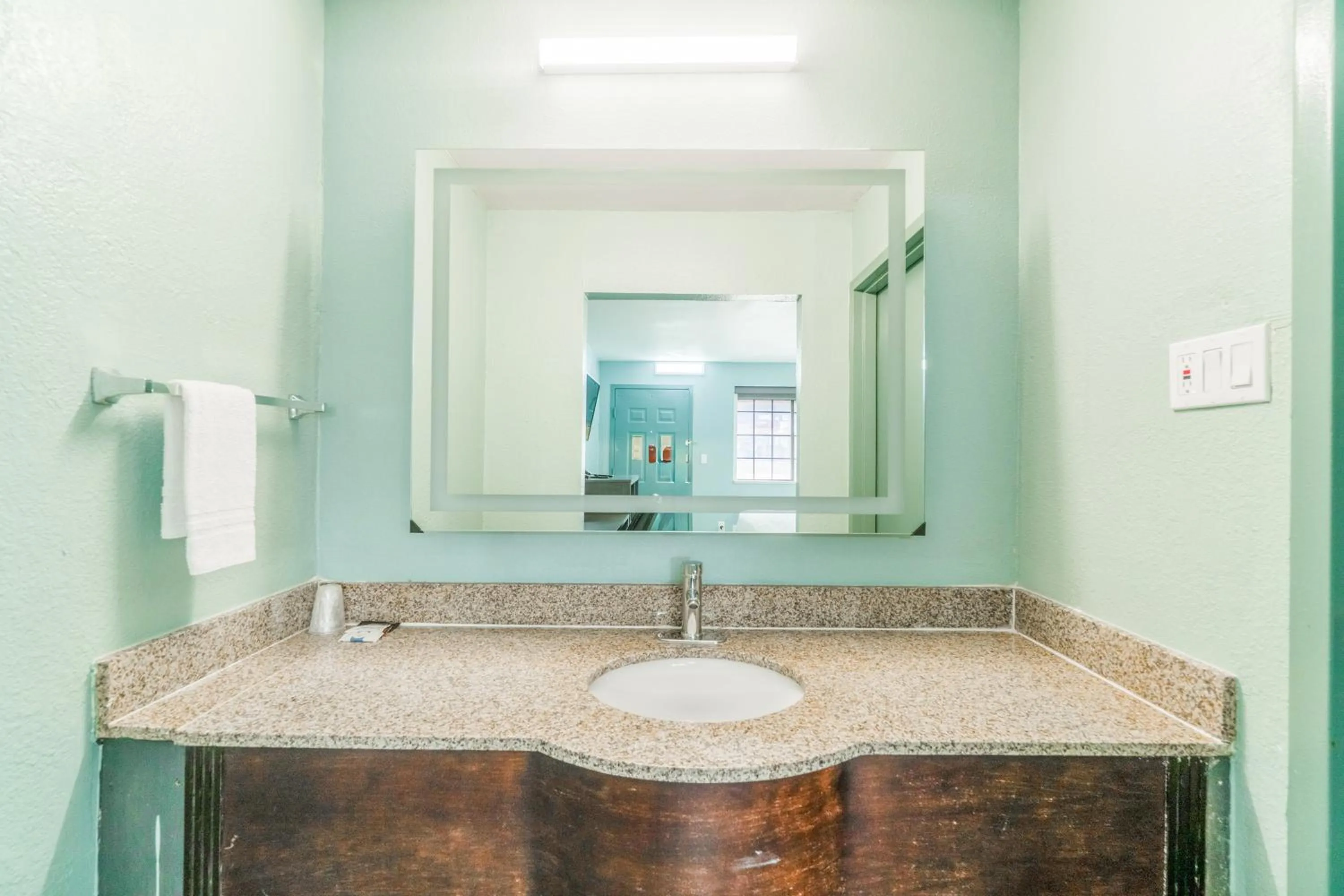 Bathroom in Lone Star Inn & Suites by OYO Harlingen TX