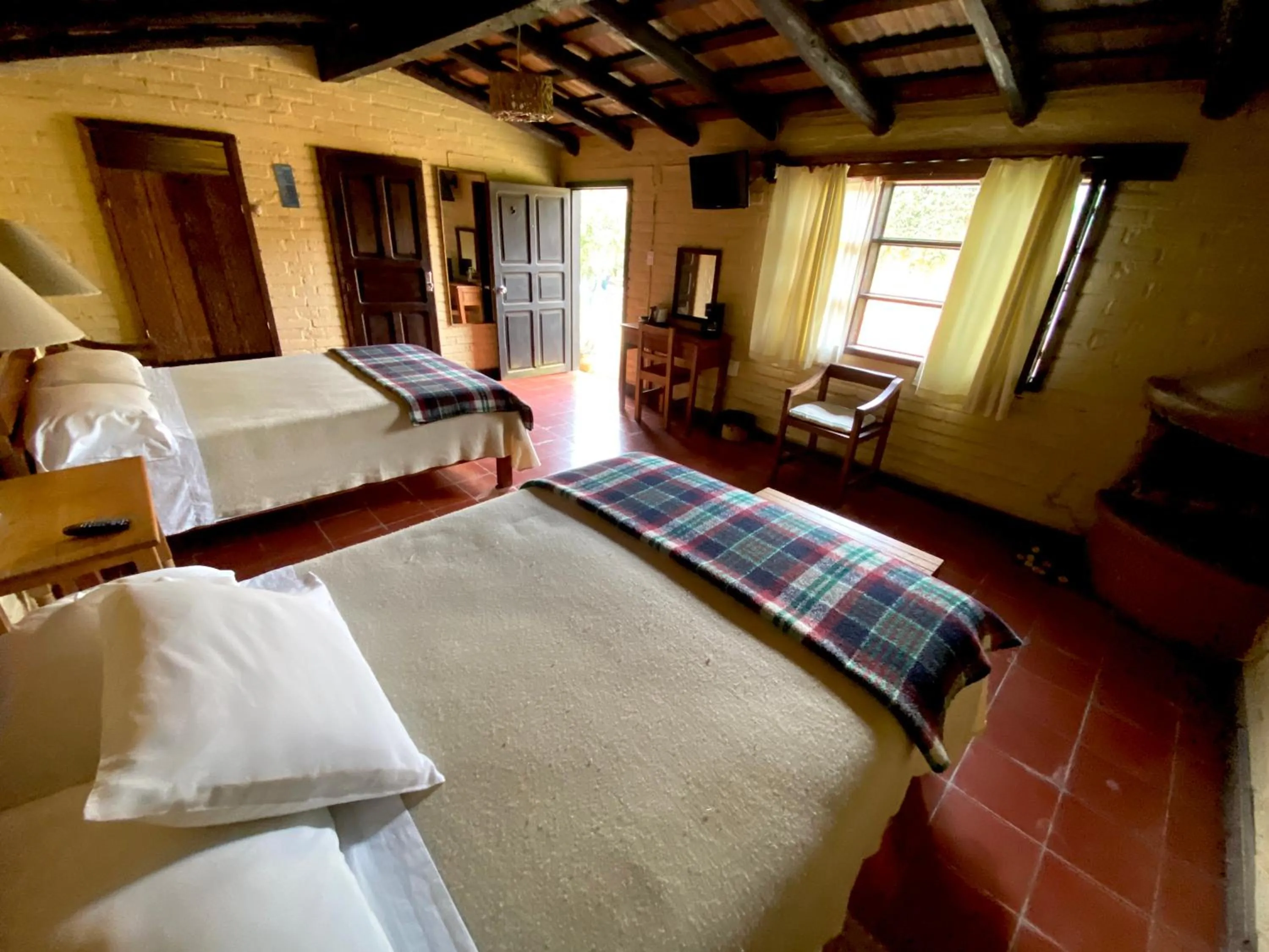 Photo of the whole room, Bed in Villa Patzcuaro Garden Hotel
