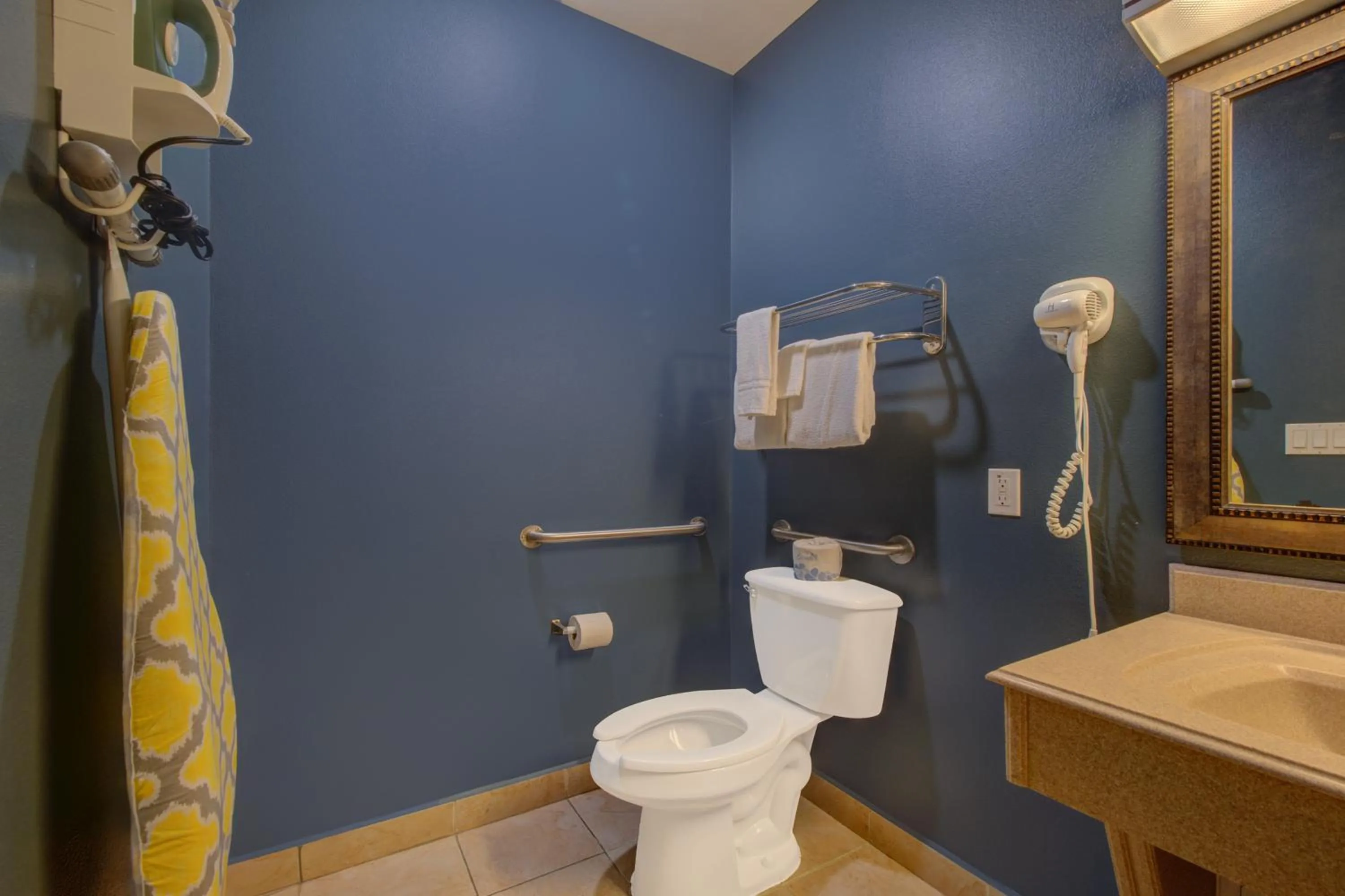 Bathroom in Weslaco Inn by Capital O Near Mercedes