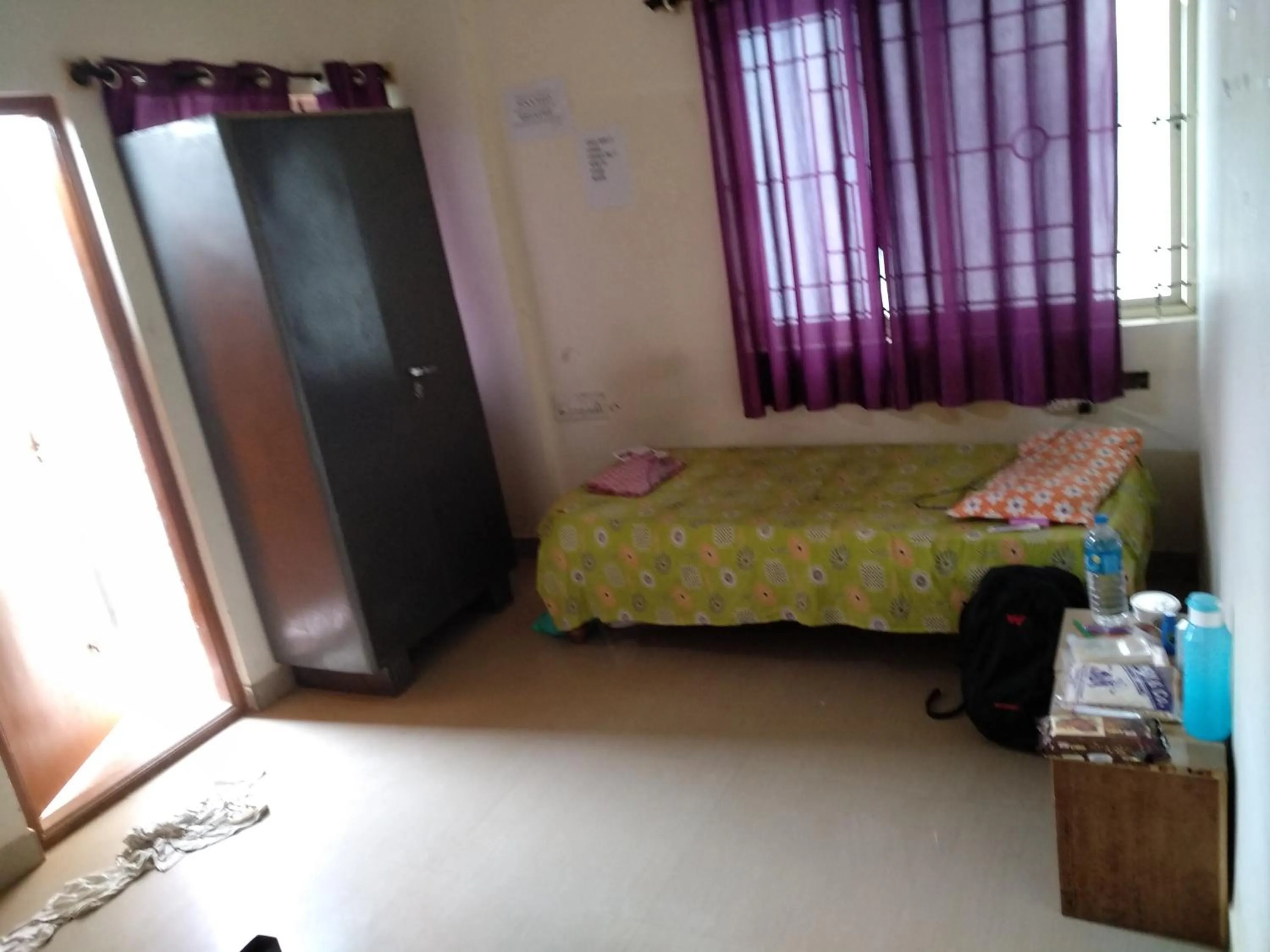 Photo of the whole room, Bed in Professionals Pride PG