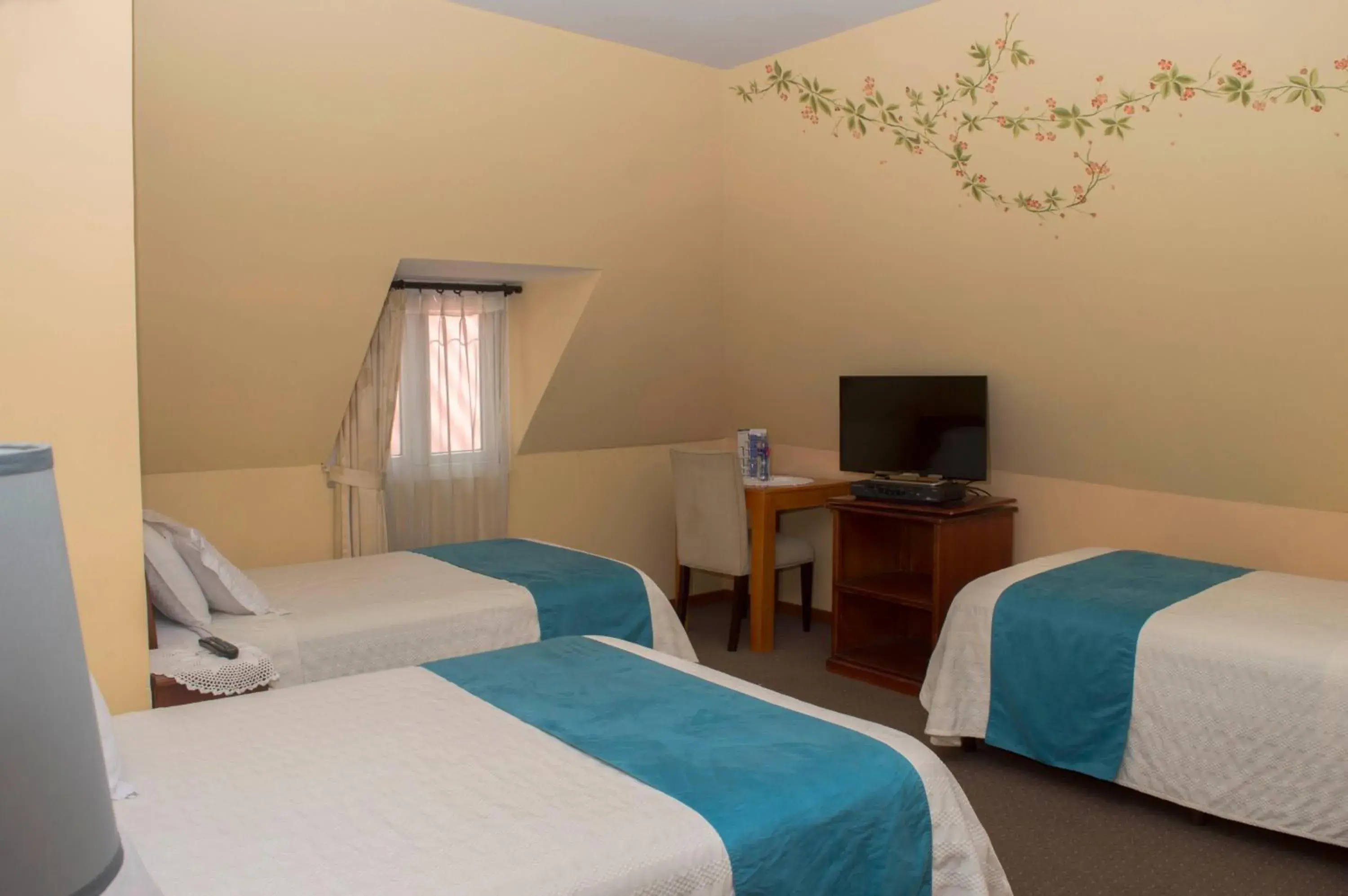 Triple Room in Hotel La Casona Triple Room in Hotel La Casona