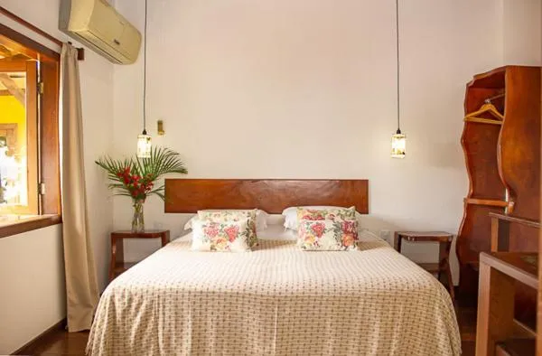 Bed in Pousada Funny