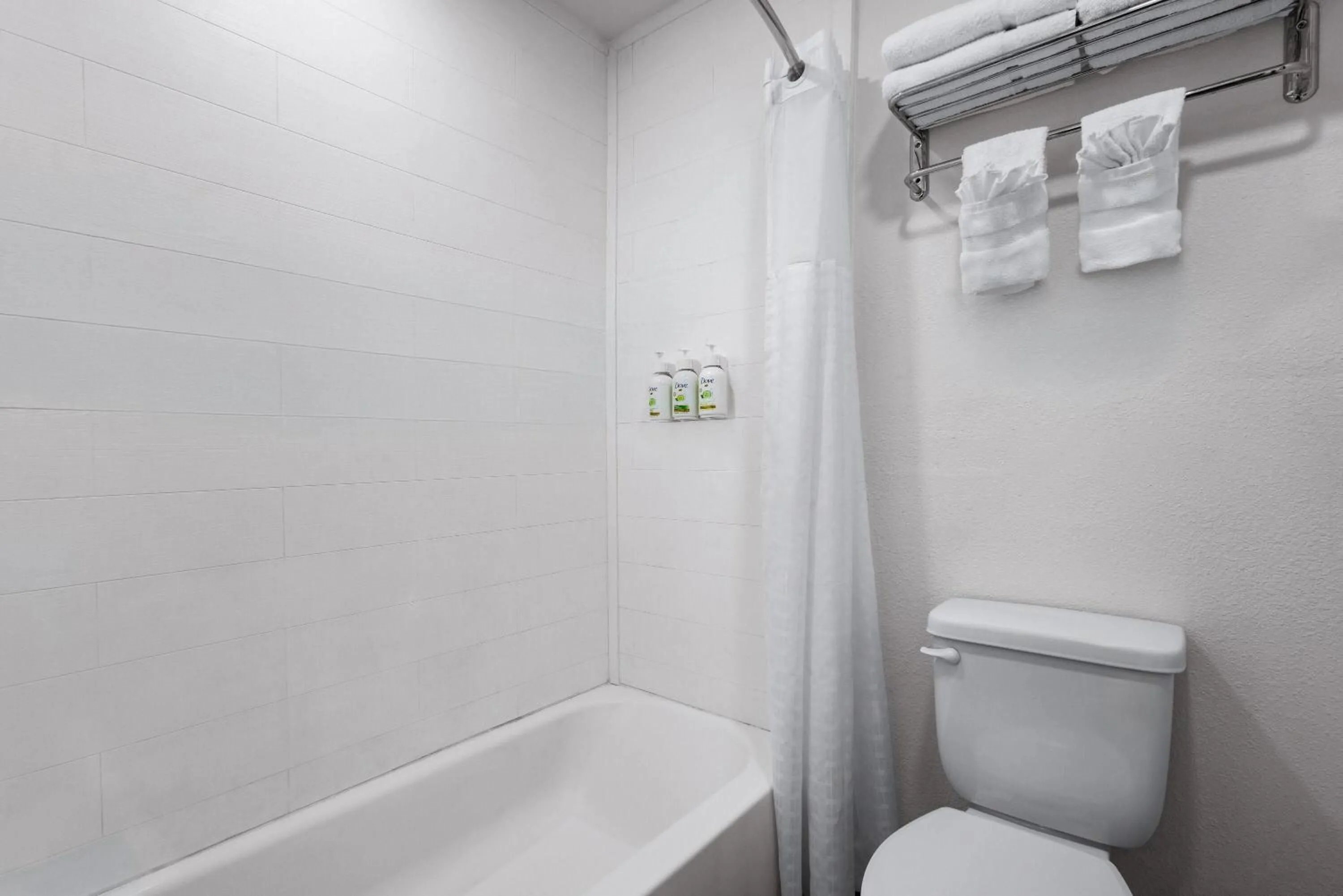 Bathroom in Ramada by Wyndham York Harrisburg Hershey