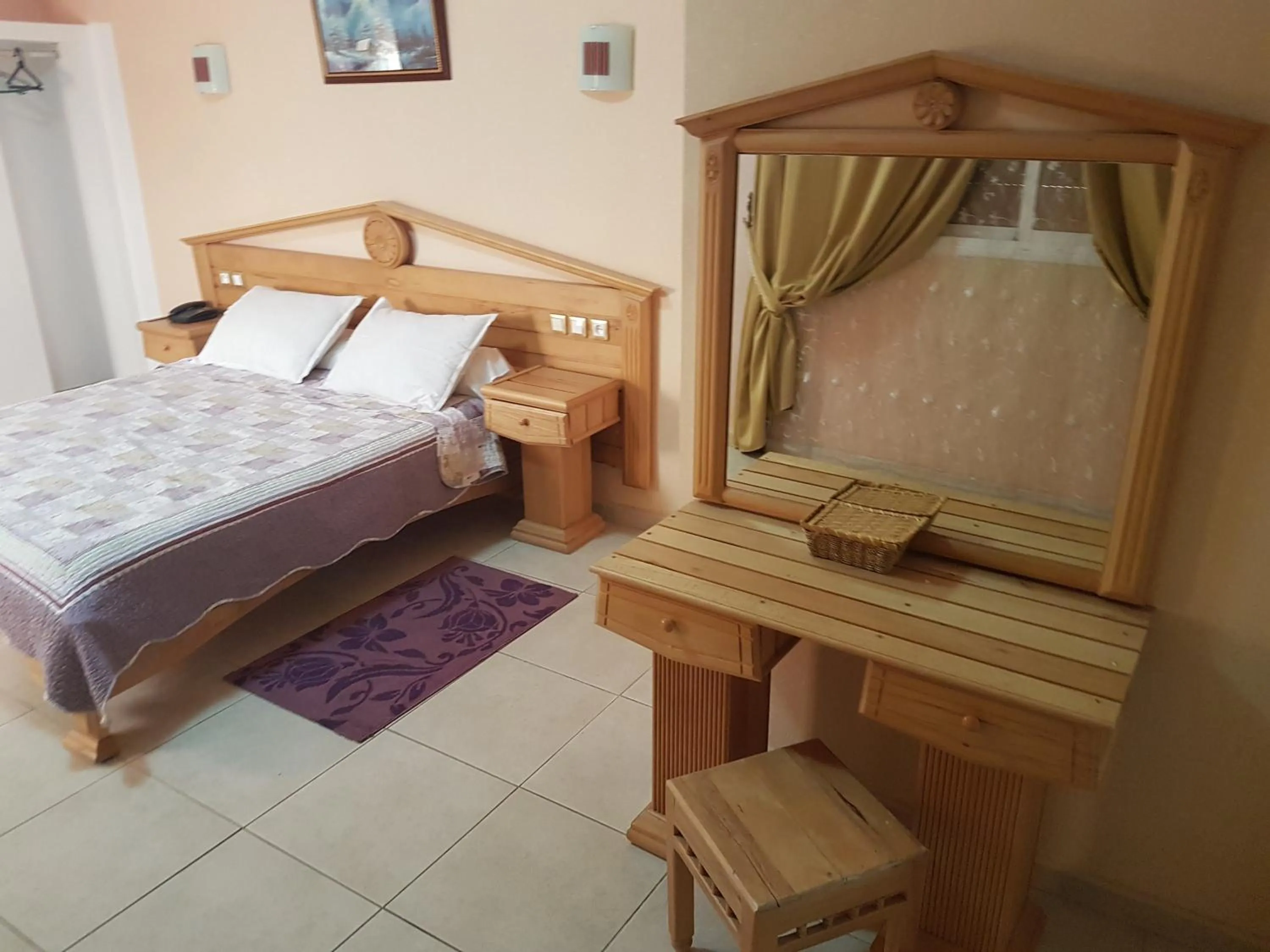 Bed in Charm El Cheikh Hotel