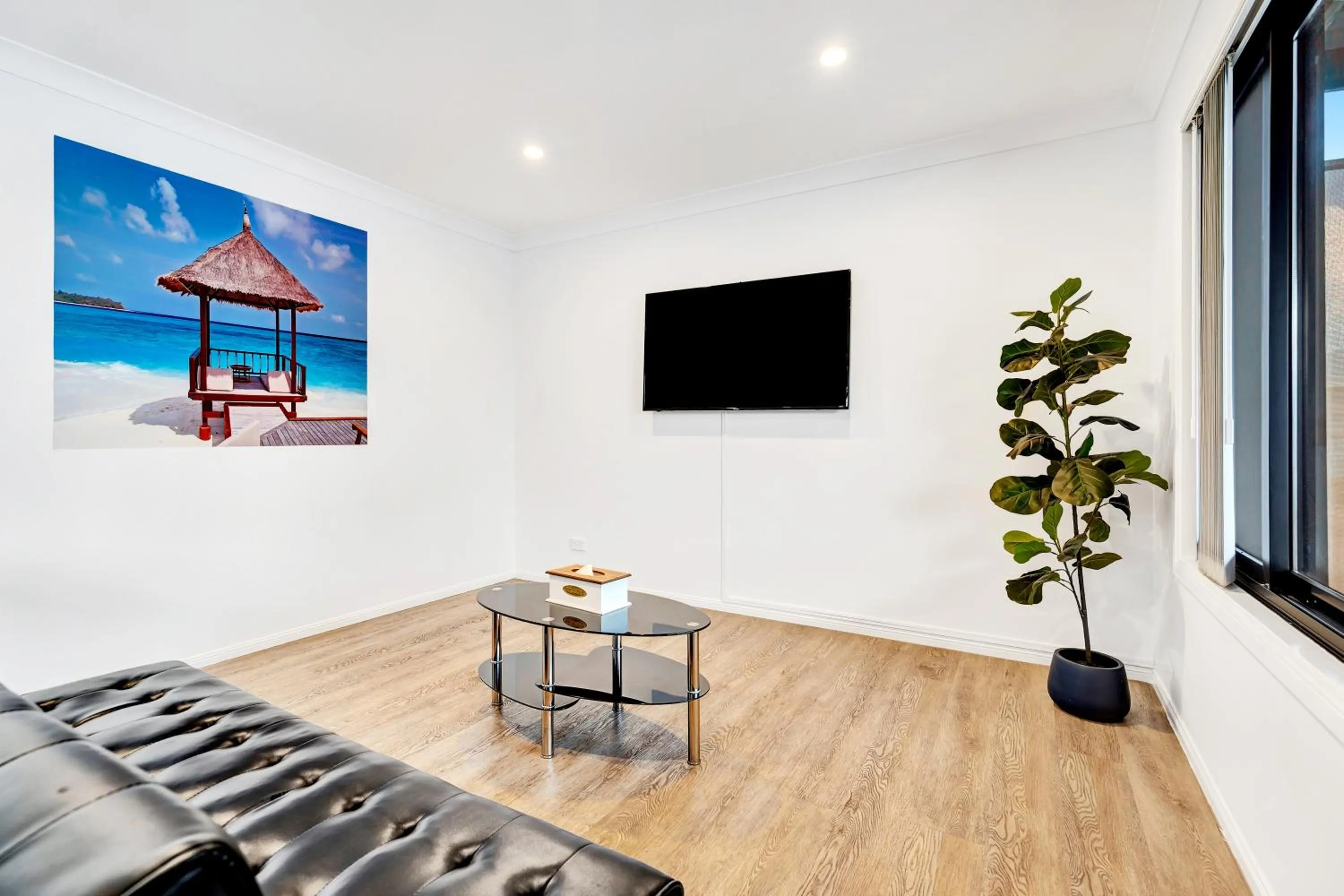 Communal lounge/ TV room in Montego Mermaid Beach Motel