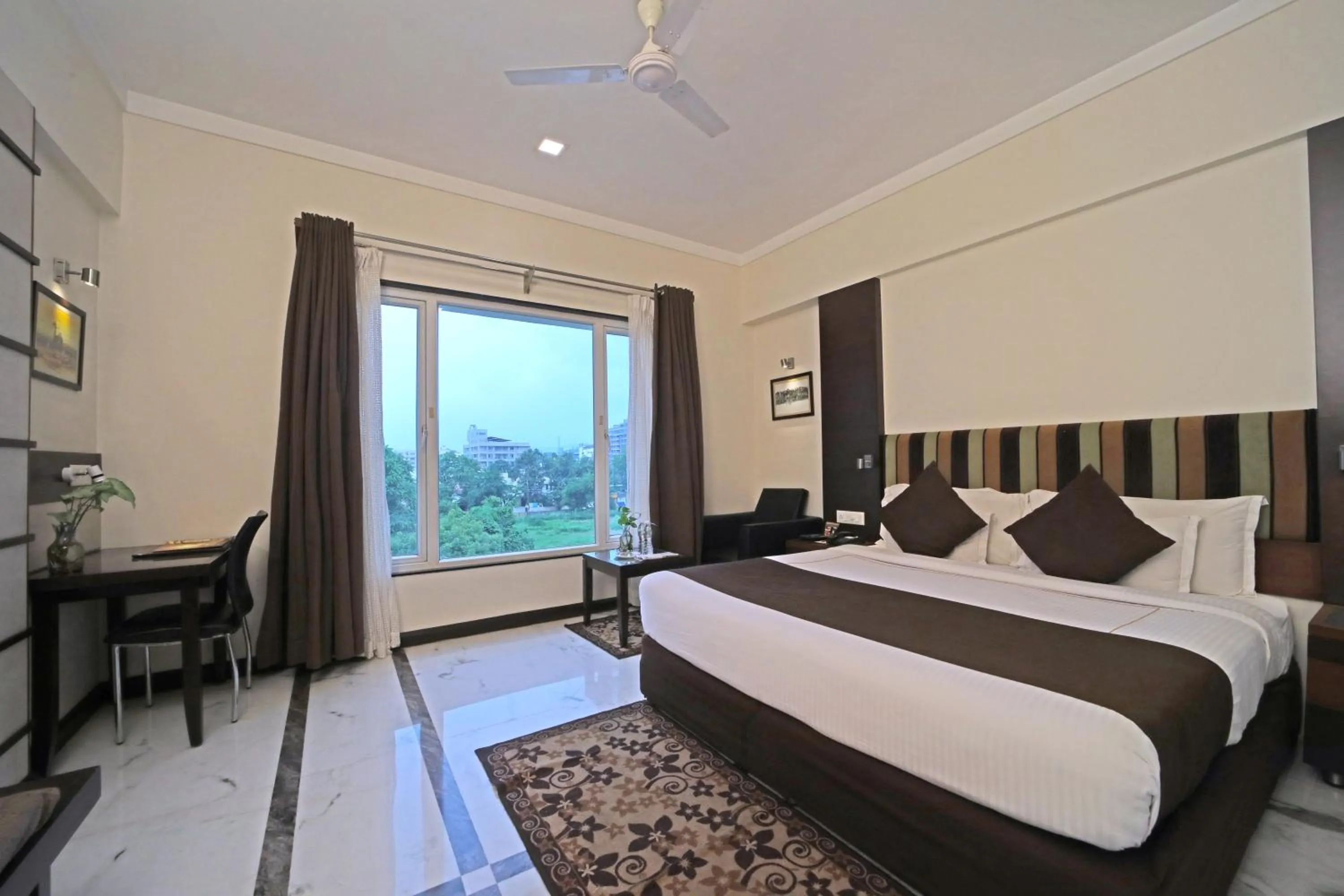 View (from property/room), Bed in Amantra Comfort Hotel