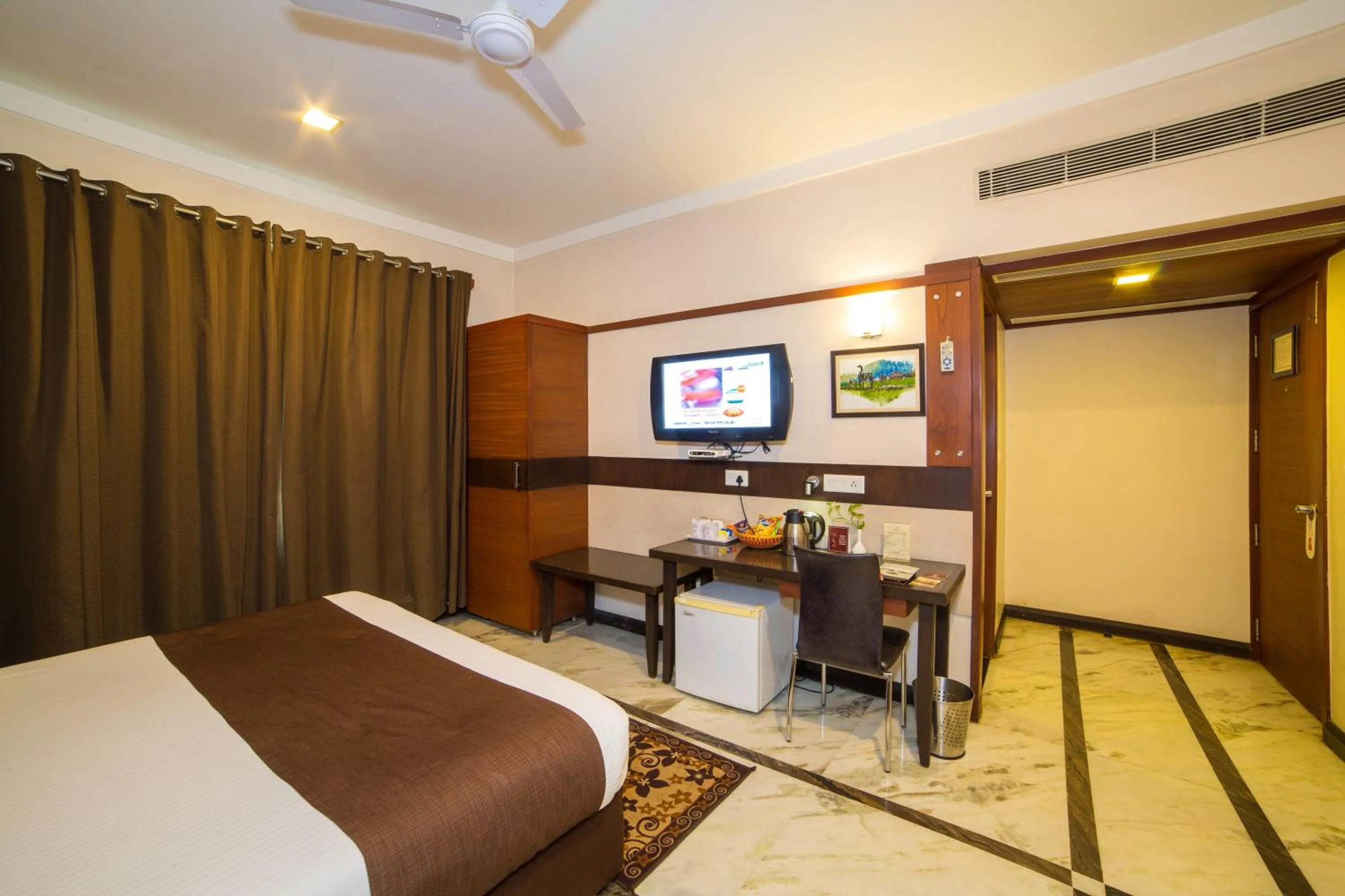 View (from property/room), Bed in Amantra Comfort Hotel