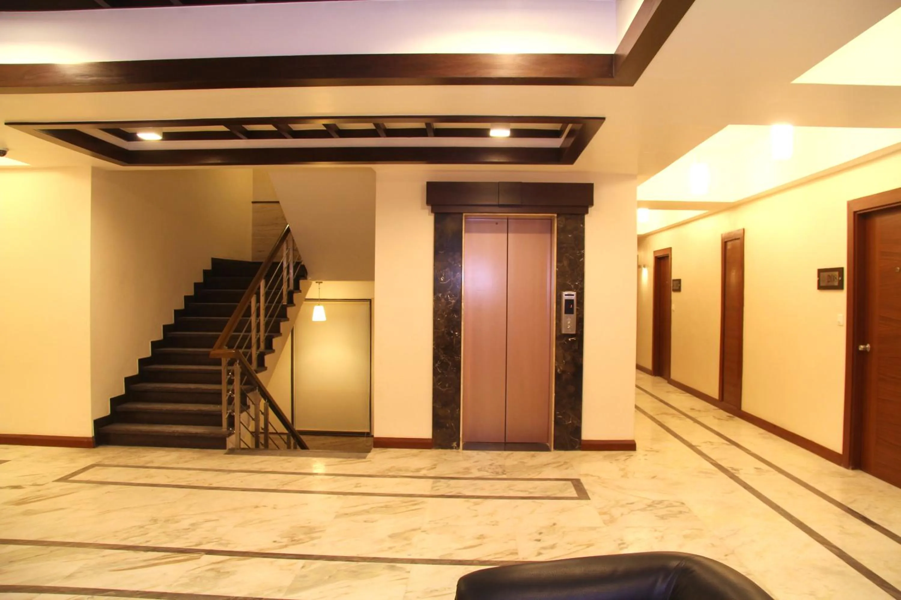 Lobby or reception in Amantra Comfort Hotel