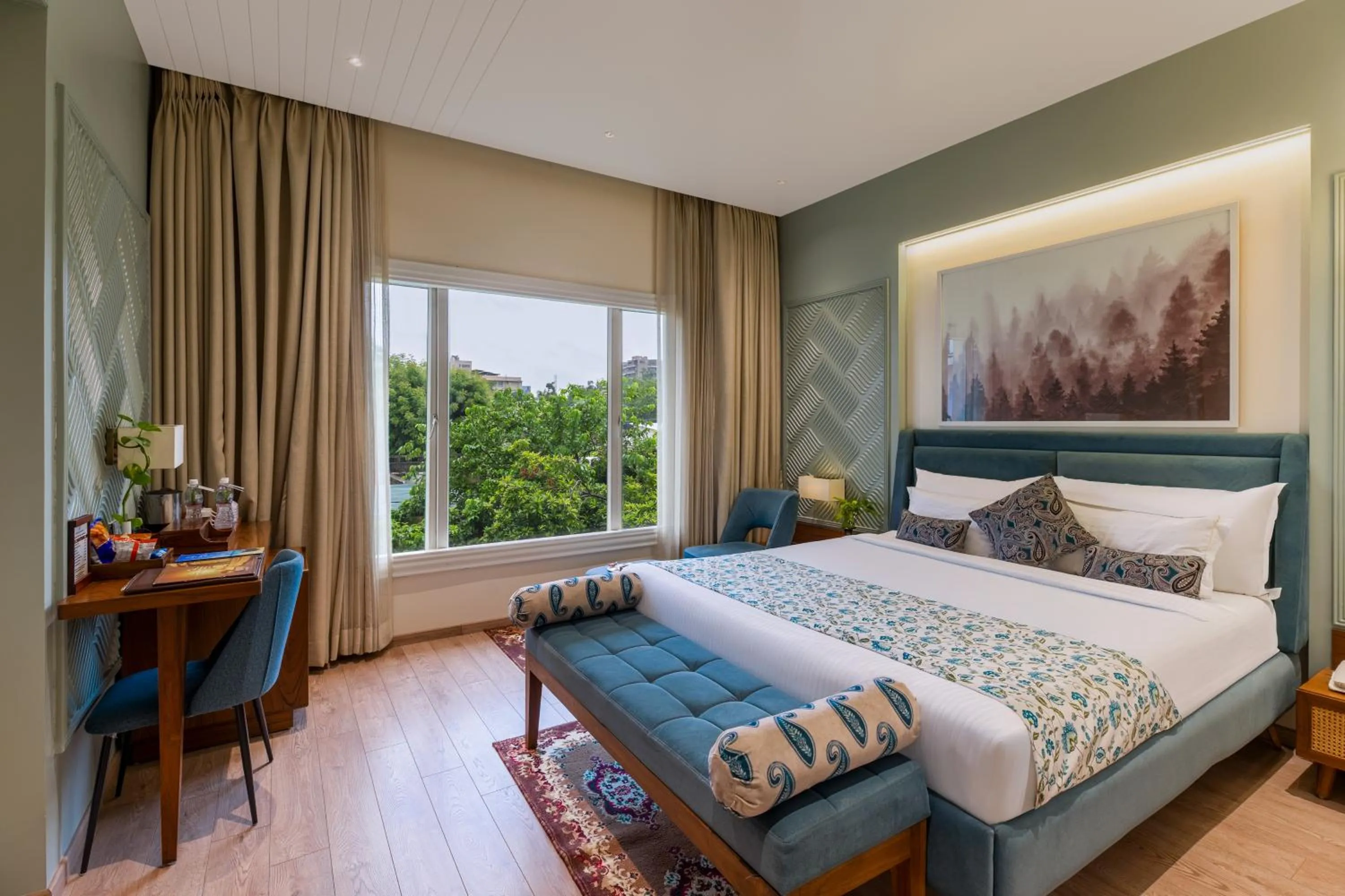 Bed in Amantra Comfort Hotel