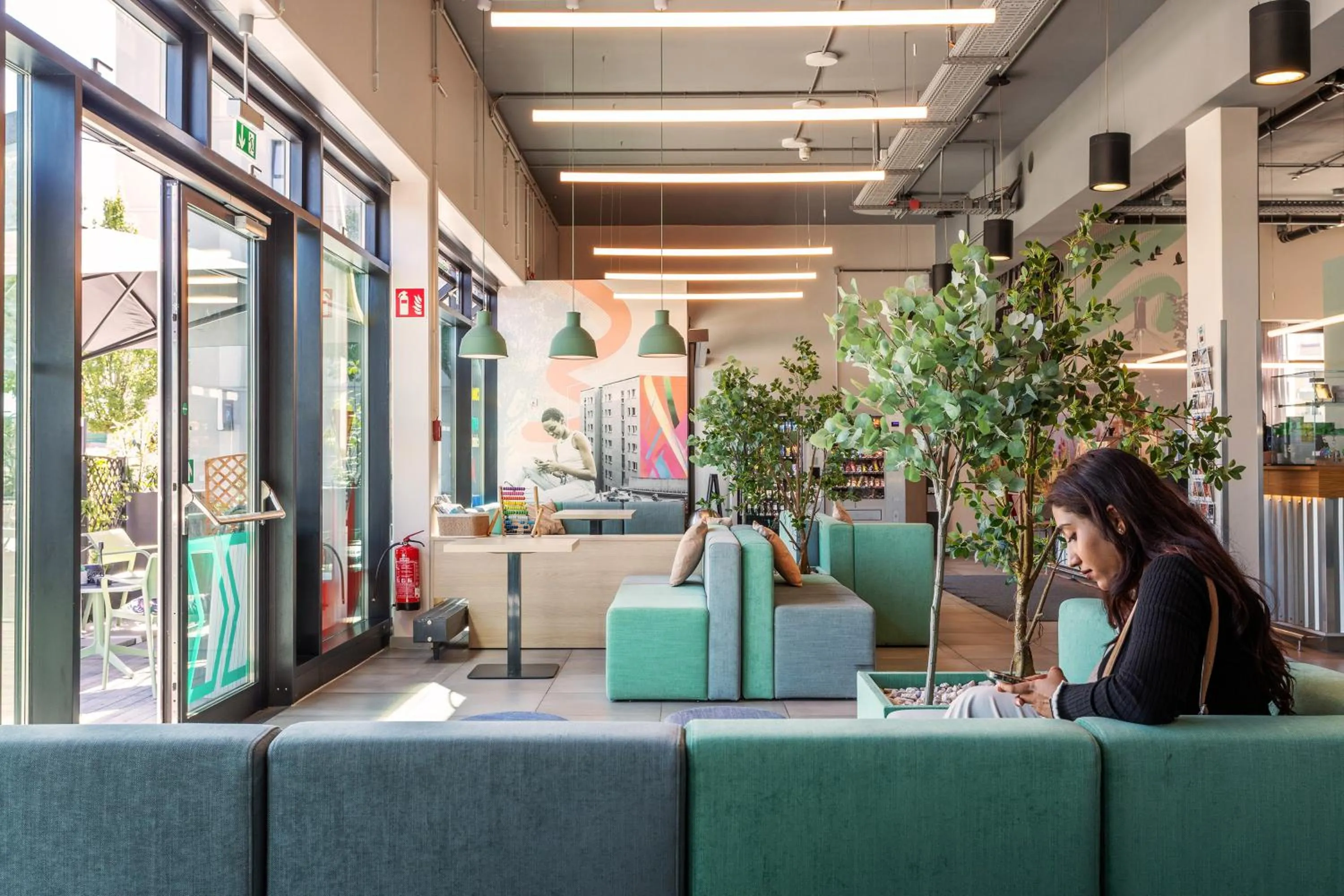Lobby or reception in MEININGER Hotel Berlin Airport